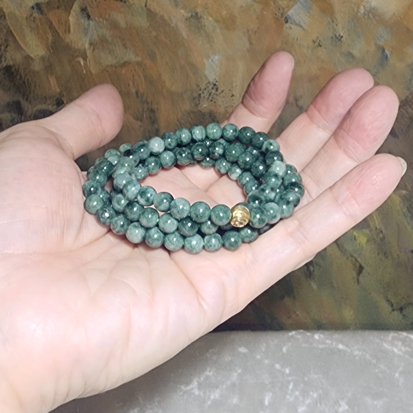 6.5mm natural untreated Burma Jade (Type A Jadeite) light green with a slight yellow hue floating flowers 108 mala necklace (with certificate) 翡翠A货淡绿微黄飘花108项链(带证书)