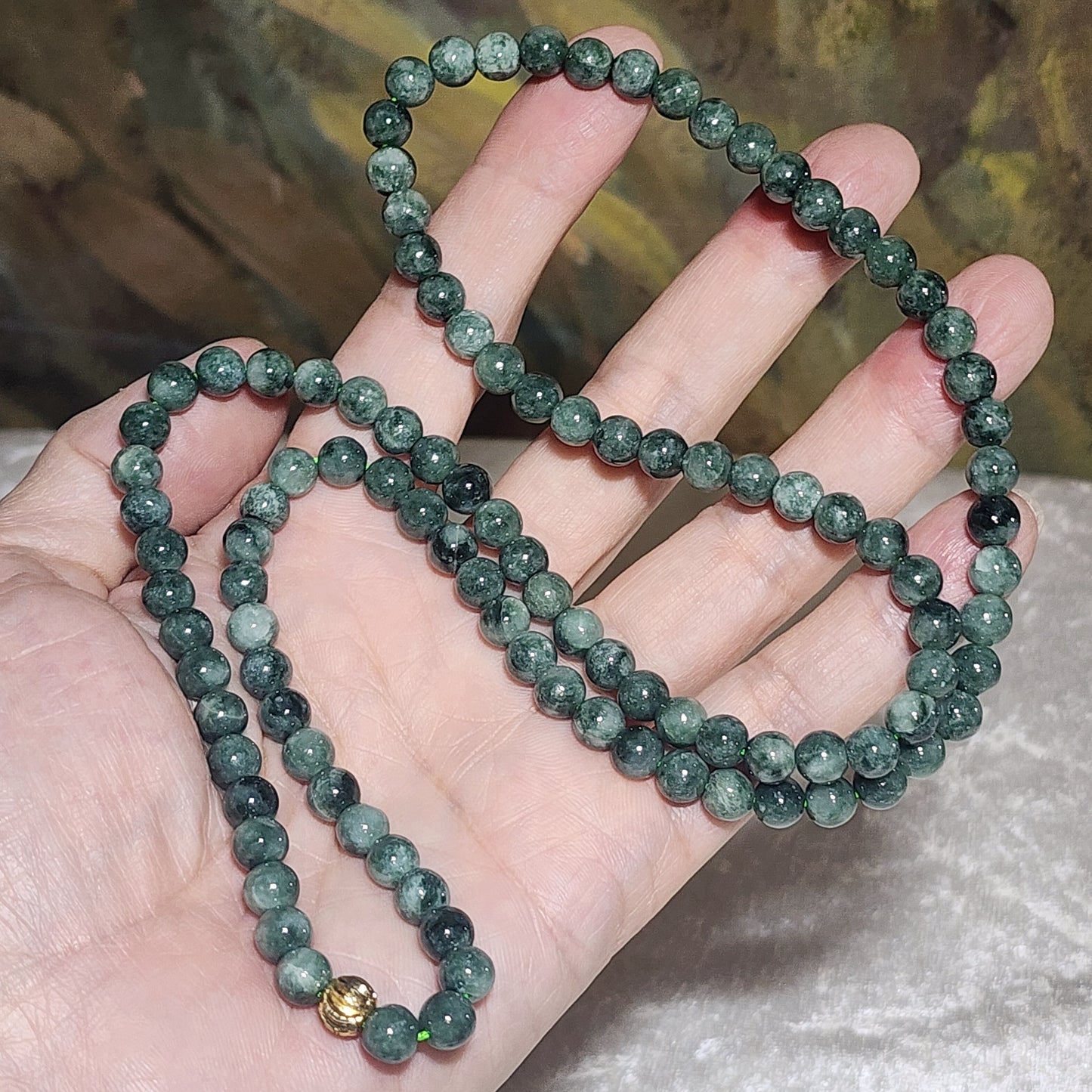 6.5mm natural untreated Burma Jade (Type A Jadeite) light green with a slight yellow hue floating flowers 108 mala necklace (with certificate) 翡翠A货淡绿微黄飘花108项链(带证书)