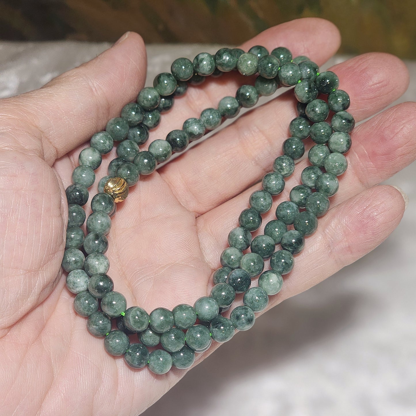 6.5mm natural untreated Burma Jade (Type A Jadeite) light green with a slight yellow hue floating flowers 108 mala necklace (with certificate) 翡翠A货淡绿微黄飘花108项链(带证书)
