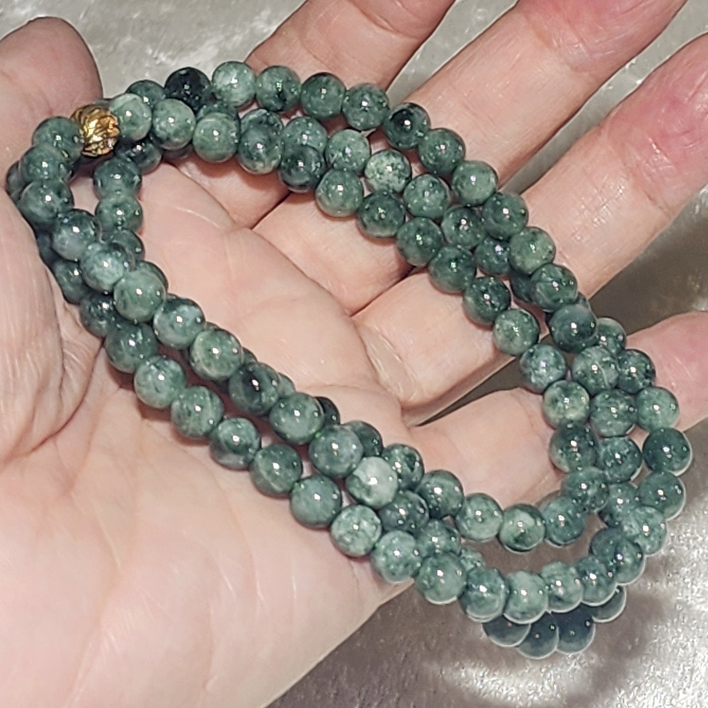 6.5mm natural untreated Burma Jade (Type A Jadeite) light green with a slight yellow hue floating flowers 108 mala necklace (with certificate) 翡翠A货淡绿微黄飘花108项链(带证书)