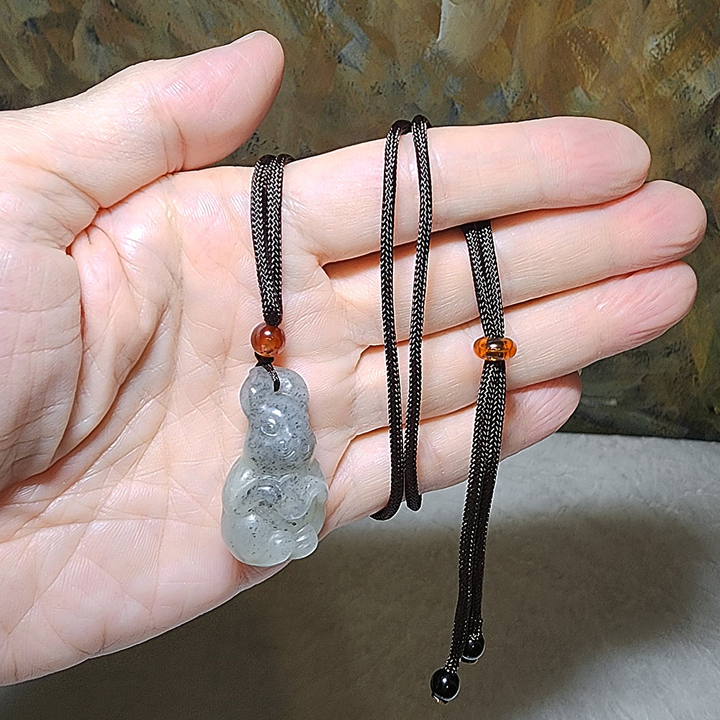 Premium natural Nephrite Qinghua (black & white) 3 dimensional Rabbit Copper Coin Jade pendant (with certificate) 和田玉新疆青花(黑白)立体兔子铜钱吊坠(带证书)