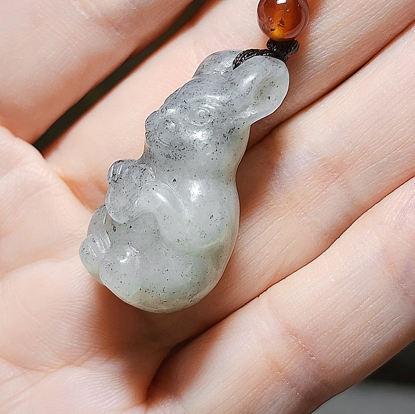 Premium natural Nephrite Qinghua (black & white) 3 dimensional Rabbit Copper Coin Jade pendant (with certificate) 和田玉新疆青花(黑白)立体兔子铜钱吊坠(带证书)