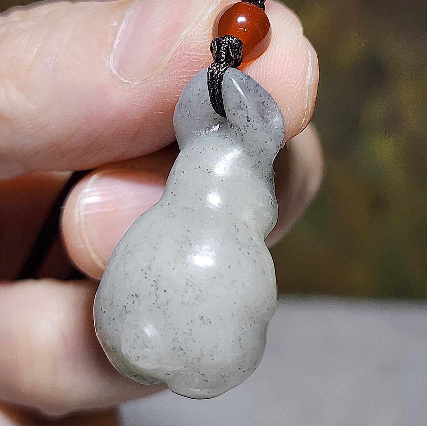 Premium natural Nephrite Qinghua (black & white) 3 dimensional Rabbit Copper Coin Jade pendant (with certificate) 和田玉新疆青花(黑白)立体兔子铜钱吊坠(带证书)
