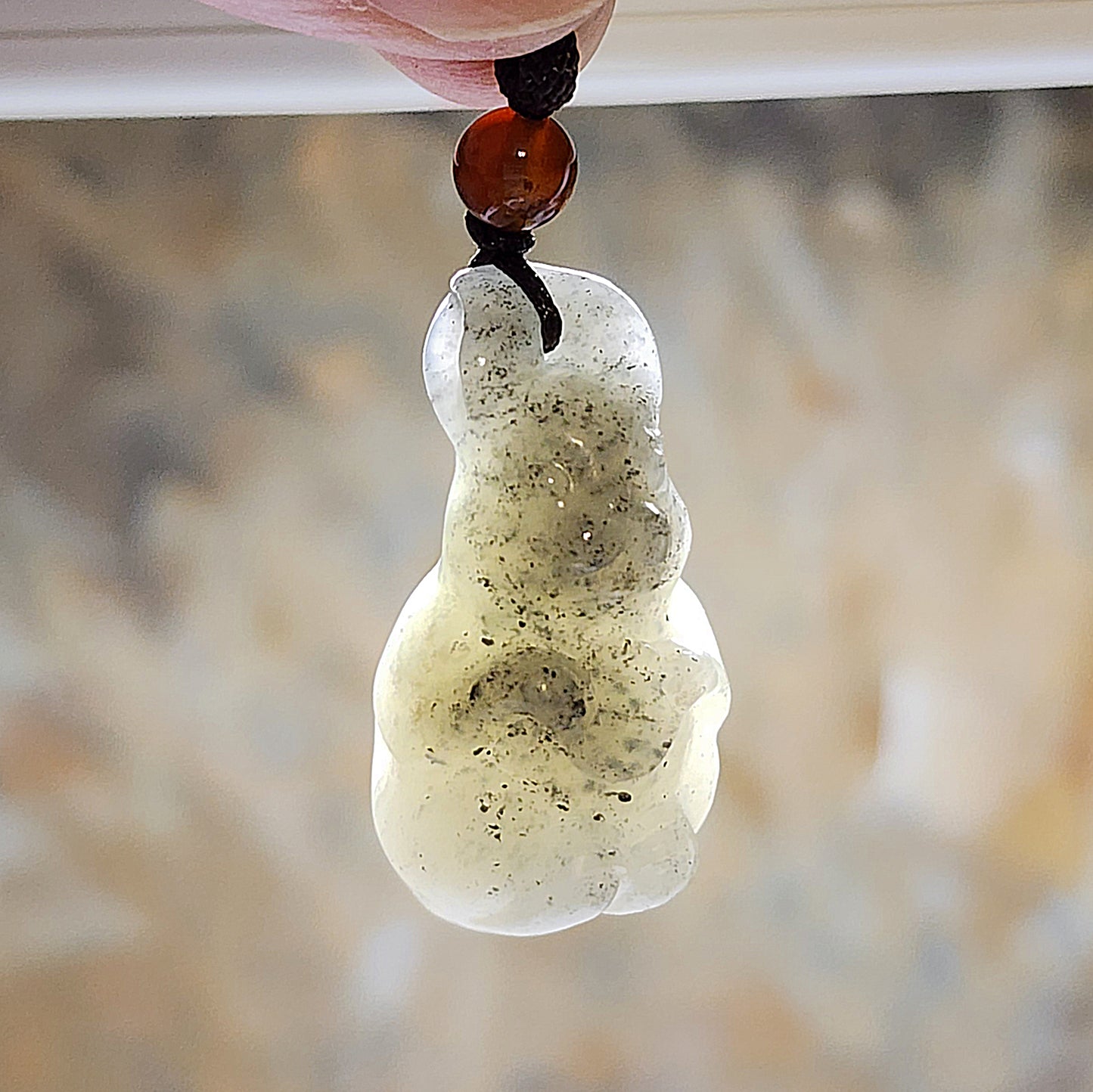 Premium natural Nephrite Qinghua (black & white) 3 dimensional Rabbit Copper Coin Jade pendant (with certificate) 和田玉新疆青花(黑白)立体兔子铜钱吊坠(带证书)