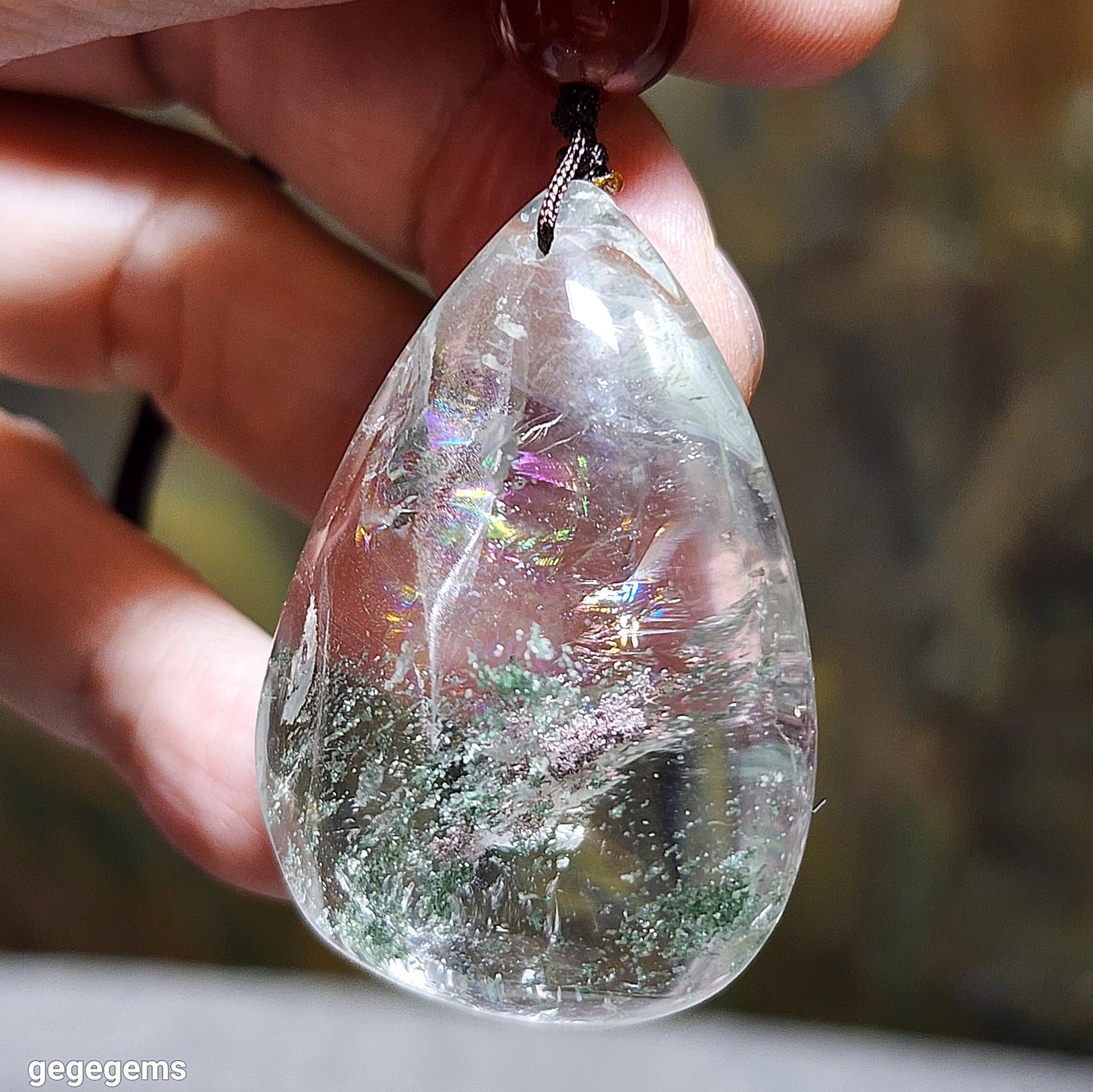 38.5 grams Green Phantom Quartz pendant / handheld Icy transparent with layers of "mountains" & a lot of rainbow reflections 透体多层绿幽灵满彩虹吊坠/手把