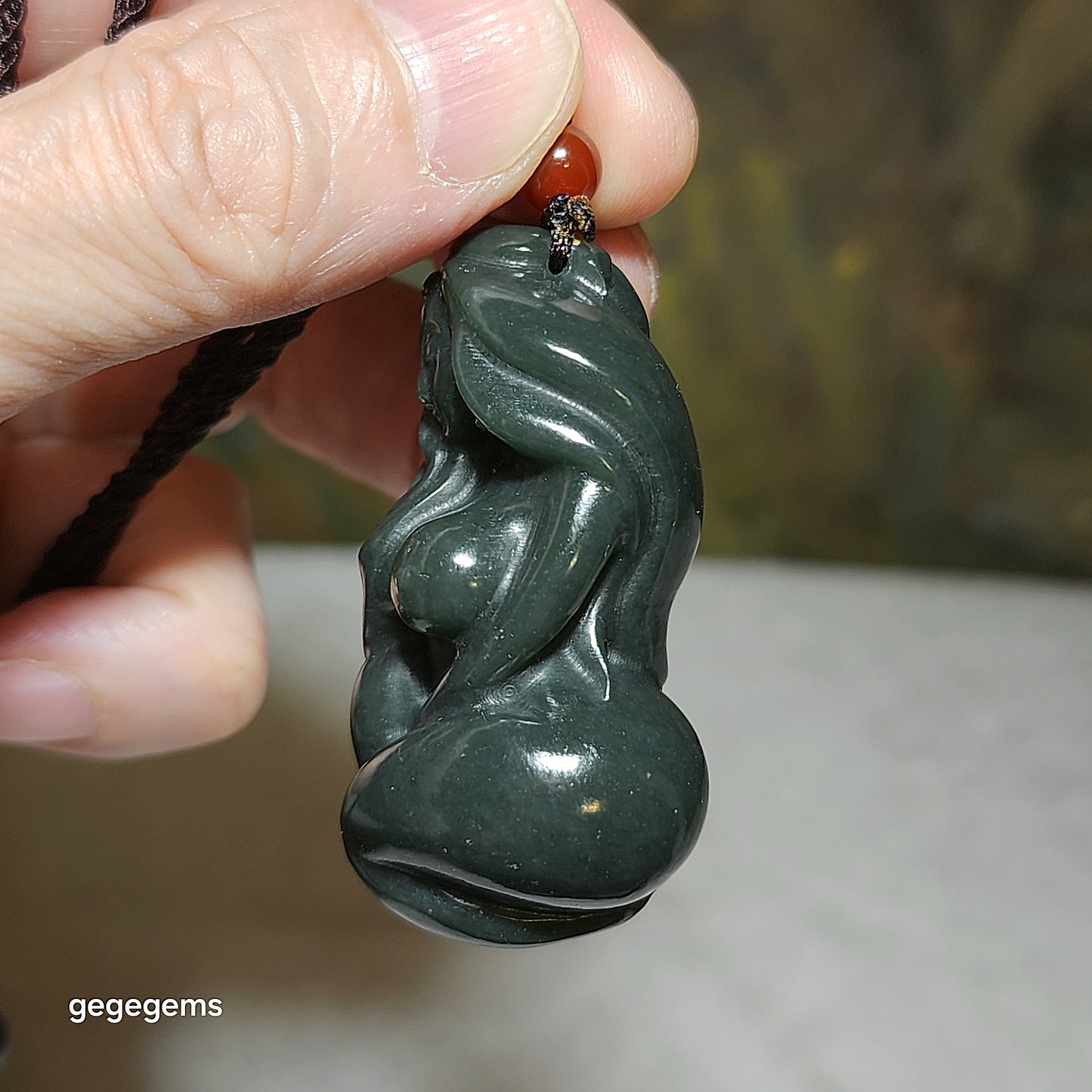 Premium Nephrite deep olive green 3 dimensional "Getting One's Savior" pendant (with certificate) 和田玉塔青深绿立体遇贵人吊坠(带证书)