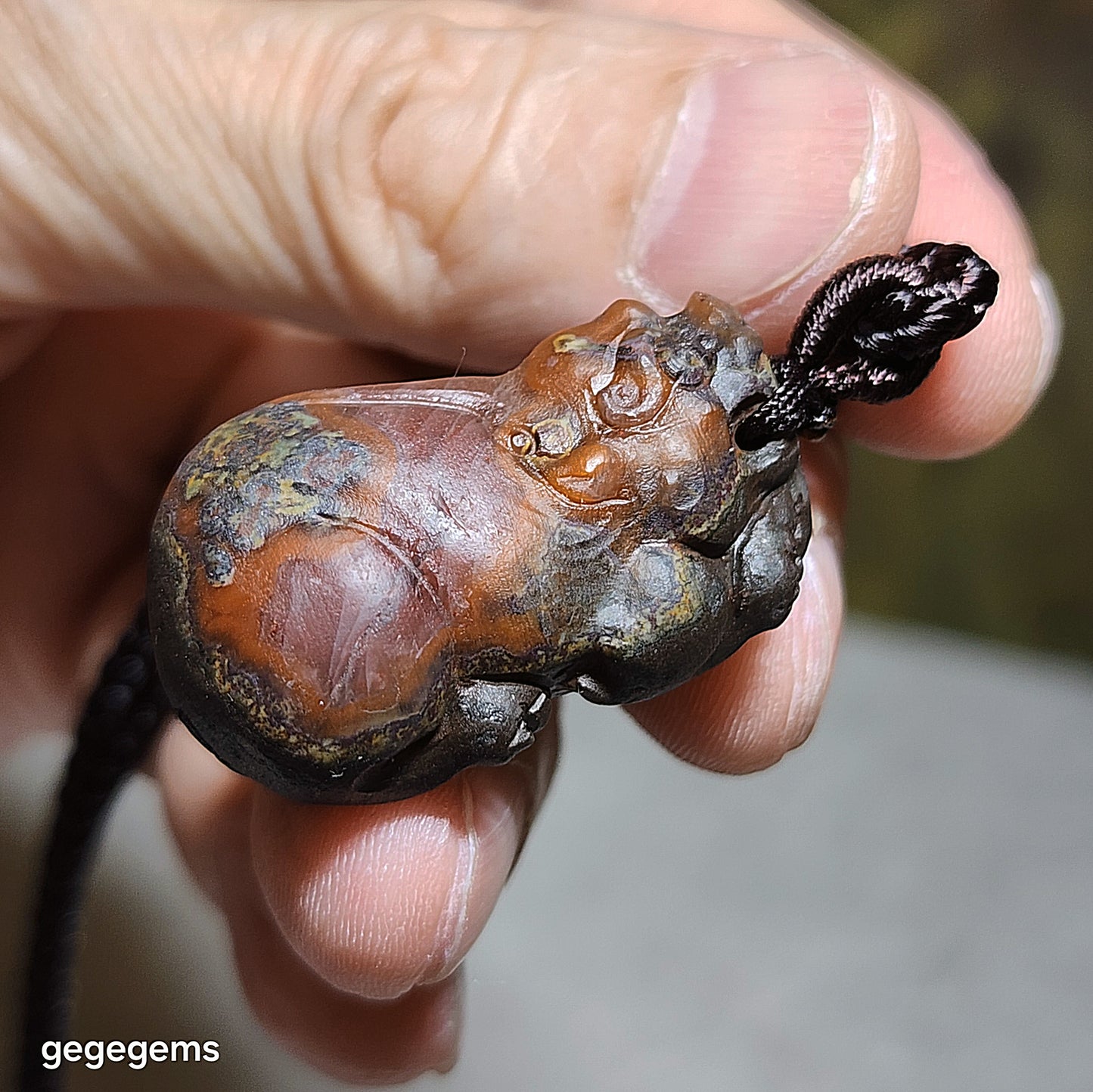 34mm Baoshan Nan Hong Adong Zhai with "skin" carved 3 dimensional Pi Xiu pendant 保山南红阿东寨带皮立体貔貅吊坠