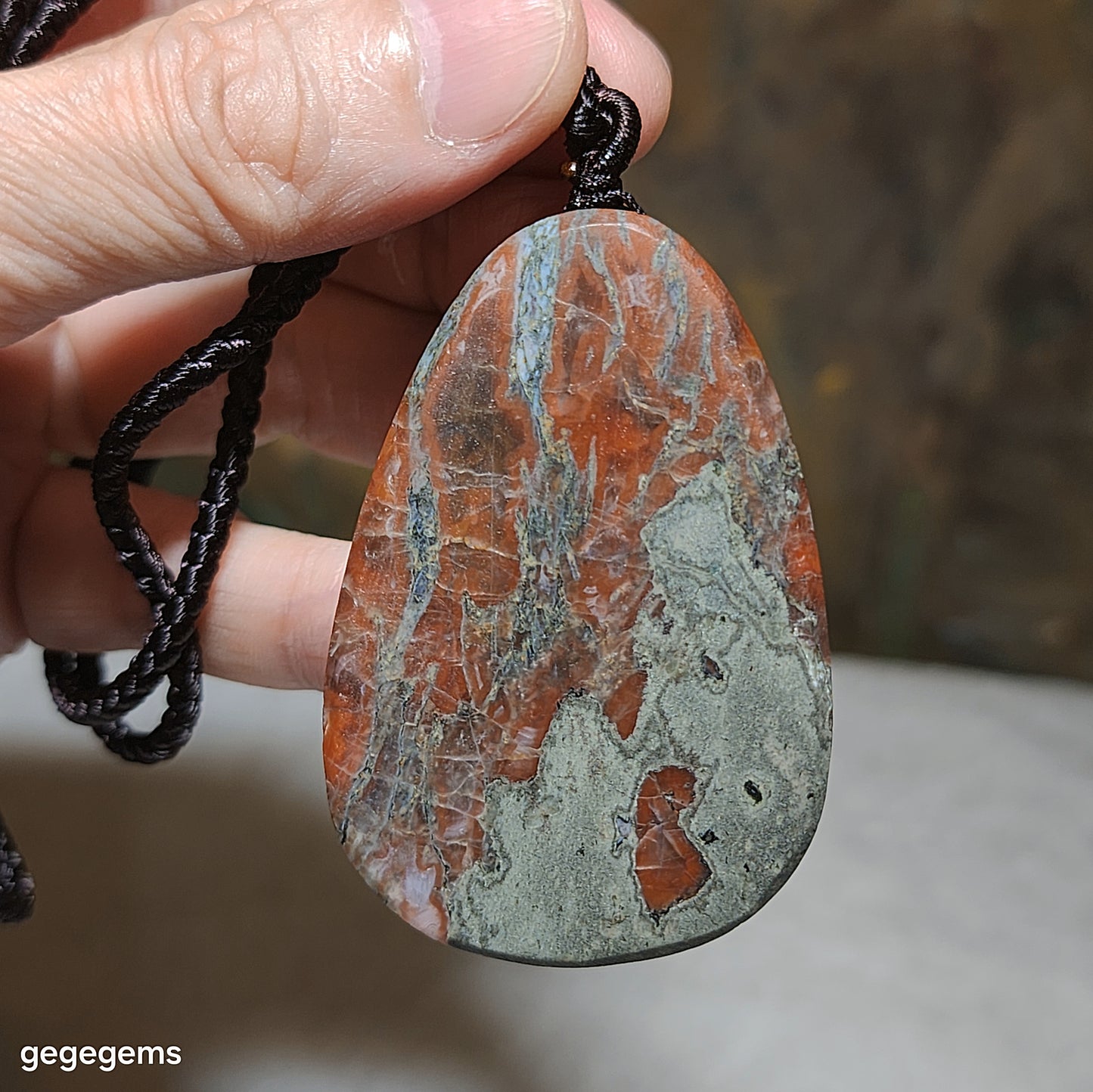 65 grams Baoshan Nan Hong Da Heidong with "skin" natural Landscape pattern pendant 保山南红大黑洞带皮天然山水图案大吊坠