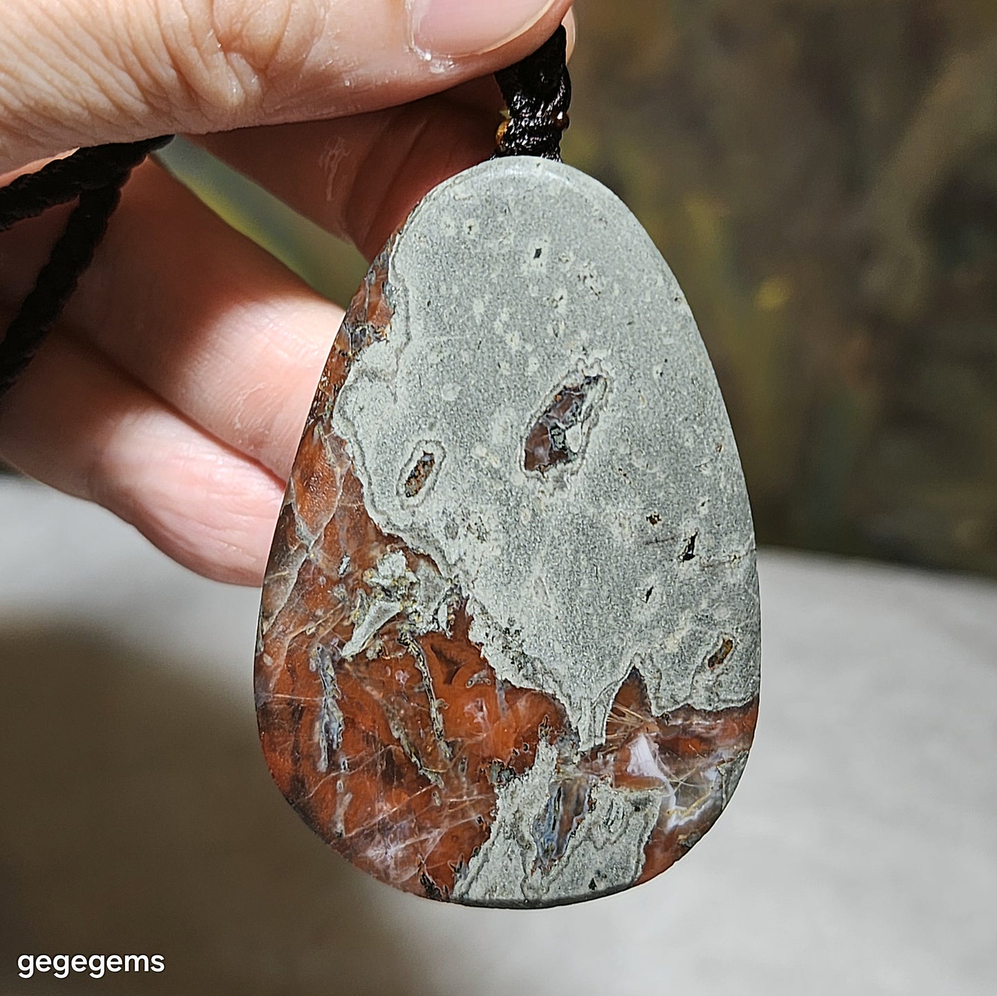 65 grams Baoshan Nan Hong Da Heidong with "skin" natural Landscape pattern pendant 保山南红大黑洞带皮天然山水图案大吊坠