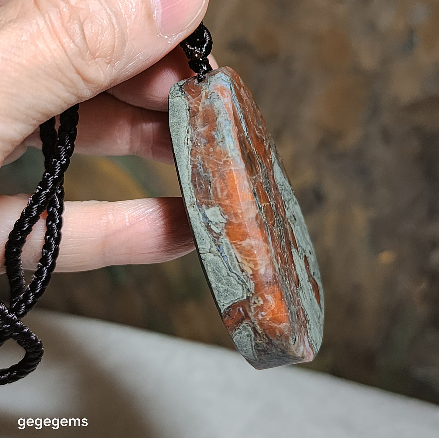 65 grams Baoshan Nan Hong Da Heidong with "skin" natural Landscape pattern pendant 保山南红大黑洞带皮天然山水图案大吊坠