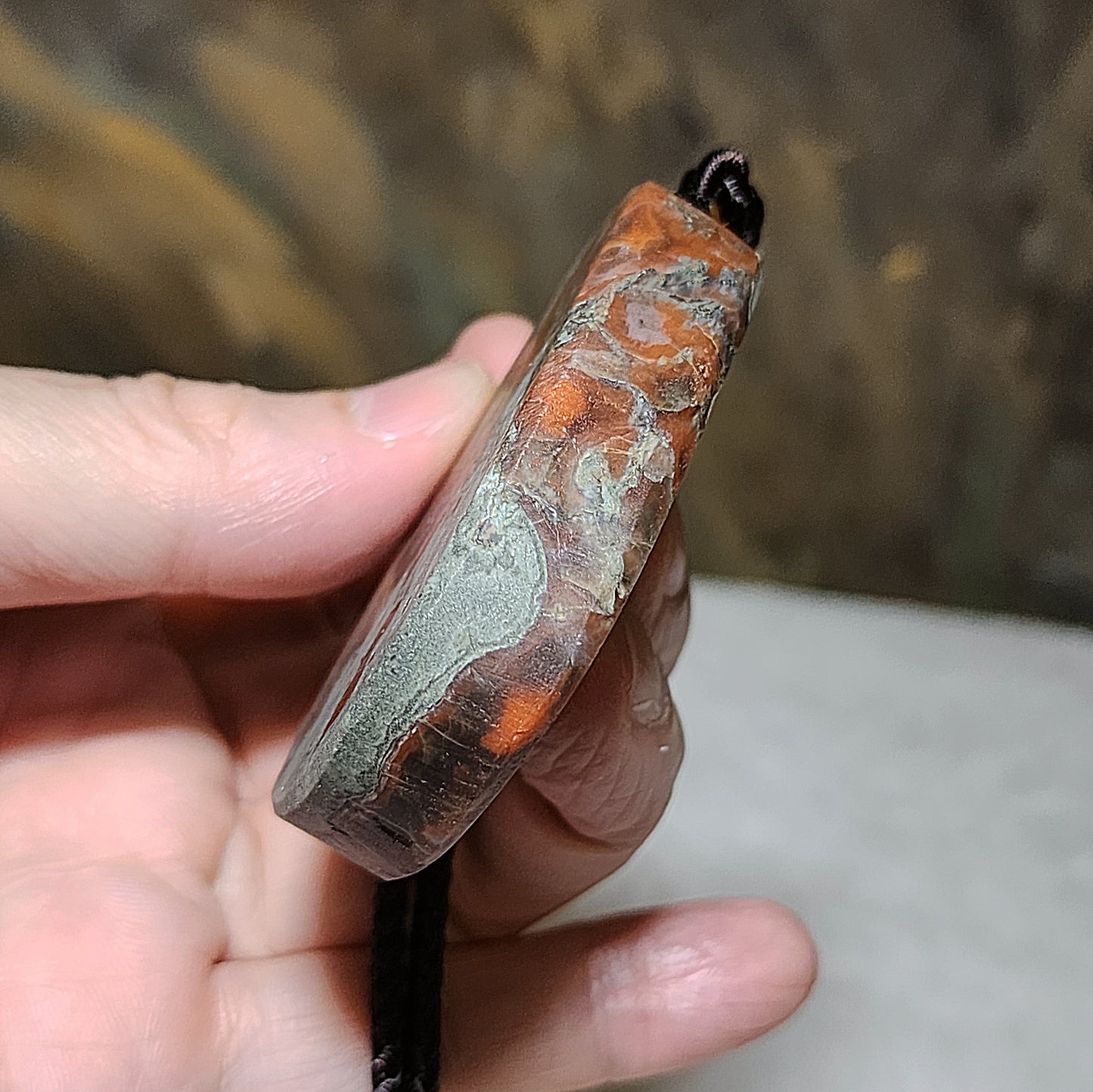65 grams Baoshan Nan Hong Da Heidong with "skin" natural Landscape pattern pendant 保山南红大黑洞带皮天然山水图案大吊坠