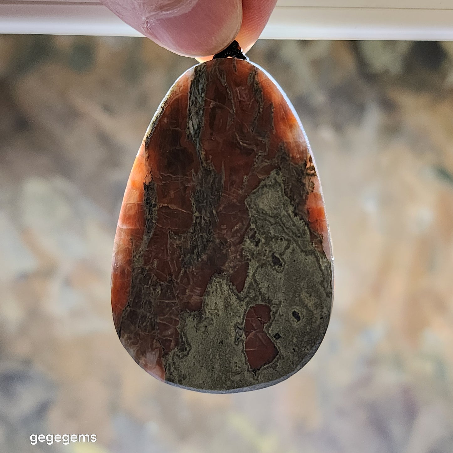 65 grams Baoshan Nan Hong Da Heidong with "skin" natural Landscape pattern pendant 保山南红大黑洞带皮天然山水图案大吊坠