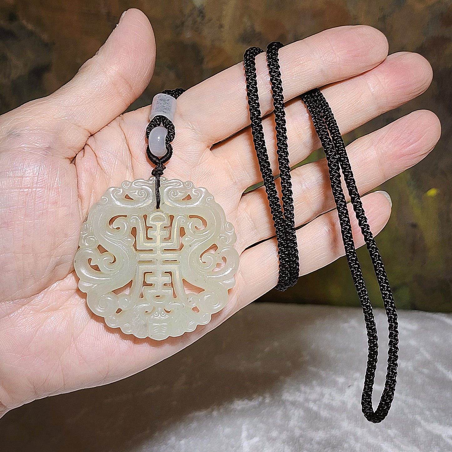 Premium Nephrite warm white light green hue hollowed out carved on both sides double dragons, bat and "longevity (寿) Jade pendant (with certificate) 优质和田玉暖白淡绿镂空双面刻双龙蝙蝠小篆体"寿"字吊坠(带证书)