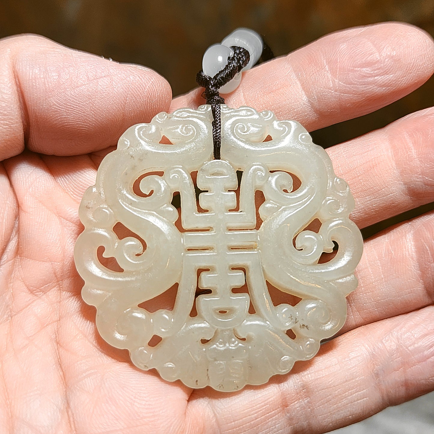Premium Nephrite warm white light green hue hollowed out carved on both sides double dragons, bat and "longevity (寿) Jade pendant (with certificate) 优质和田玉暖白淡绿镂空双面刻双龙蝙蝠小篆体"寿"字吊坠(带证书)