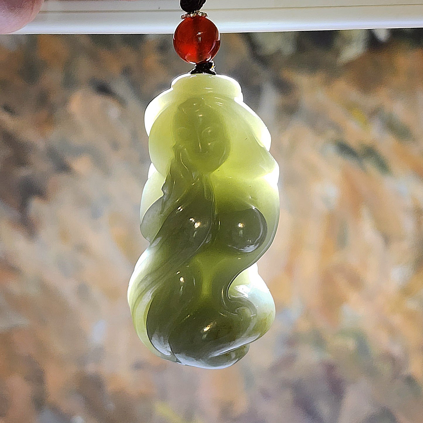 Premium Nephrite light green with caramel brown 3-dimensional "Getting One's Savior" (Jade Beauty) handheld (with certificate) 精品和田玉且末青白帶糖立体遇贵人(玉美人)手把(带证书)