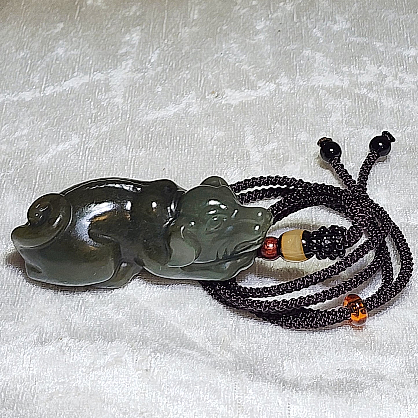 Premium Nephrite light green caramel brown Lucky Dog pendant (with certificate) 优质和田玉且末糖青白立体旺财小狗吊坠(带证书)