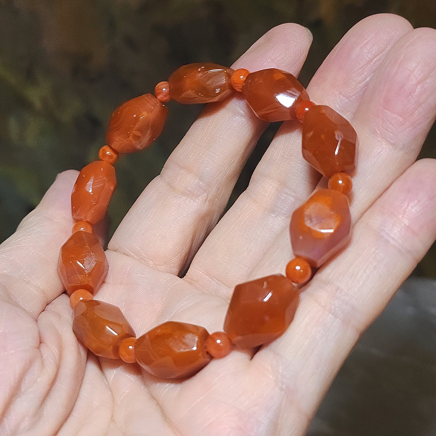 Premium Sichuan Jiukou Nan Hong persimmon red freeform faceted bracelet (with certificate) 精品川料九口南红柿子红随形切面手链(带证书)