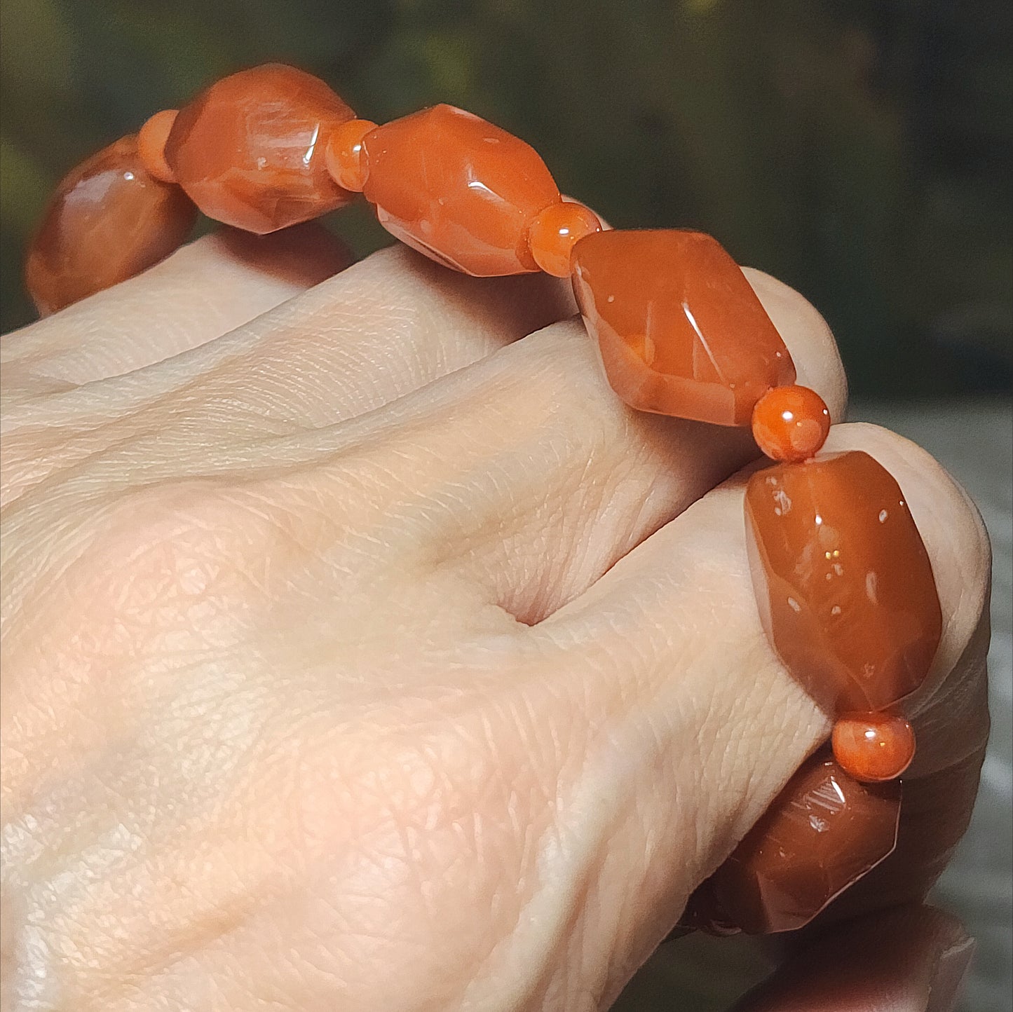 Premium Sichuan Jiukou Nan Hong persimmon red freeform faceted bracelet (with certificate) 精品川料九口南红柿子红随形切面手链(带证书)