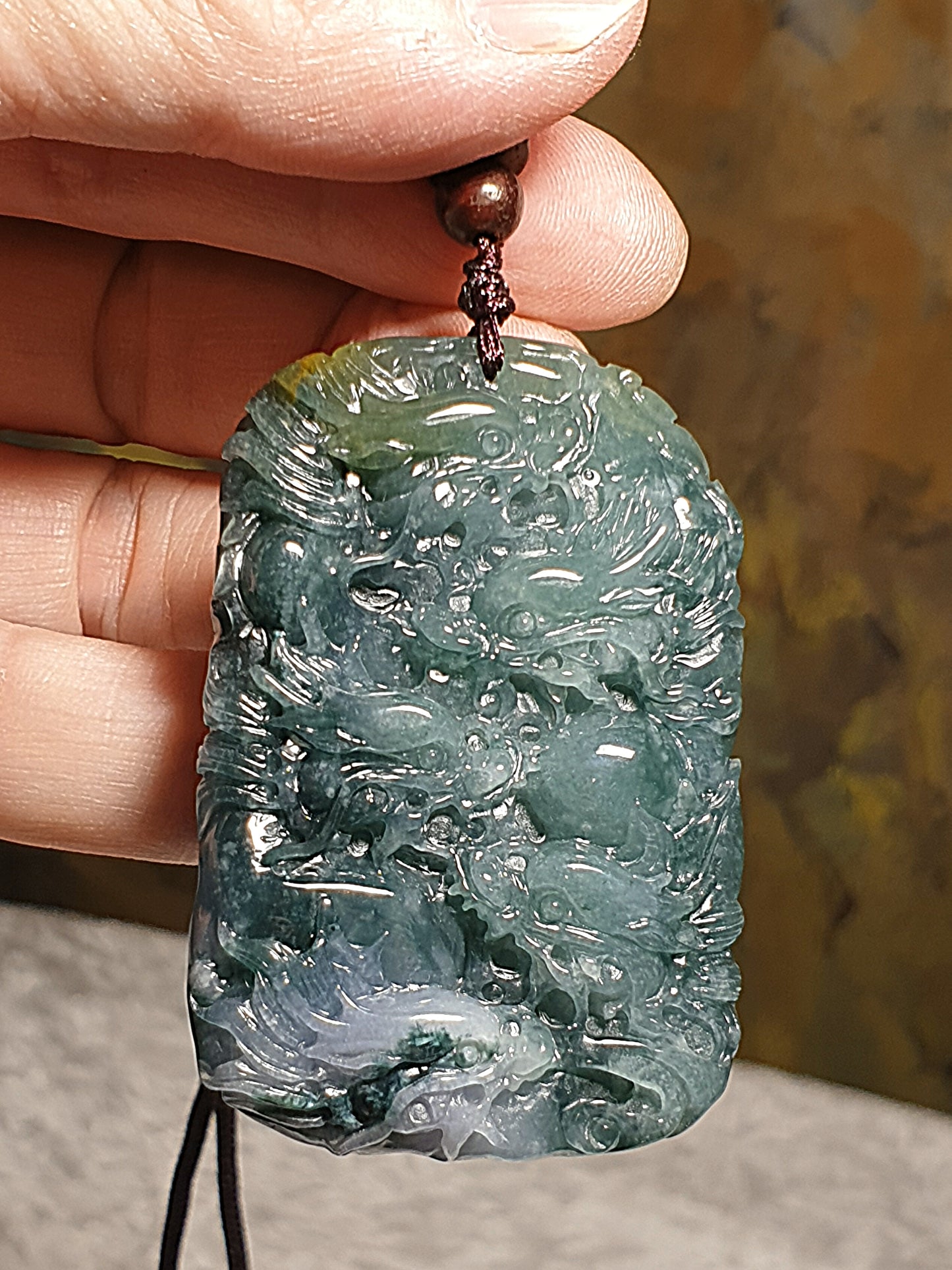 Type A Jadeite bluish green with Yellow Jadeite Nine Dragons (front 5, back 4) pendant (with certificate) 翡翠蓝绿带黄翡九龙(前五后四)吊坠(带证书)