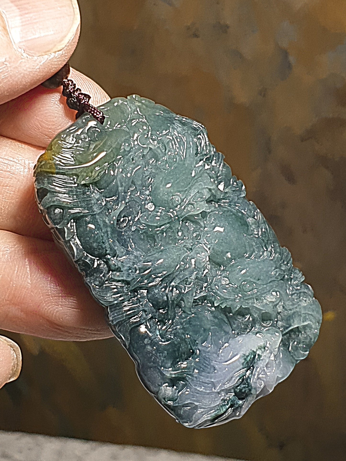 Type A Jadeite bluish green with Yellow Jadeite Nine Dragons (front 5, back 4) pendant (with certificate) 翡翠蓝绿带黄翡九龙(前五后四)吊坠(带证书)
