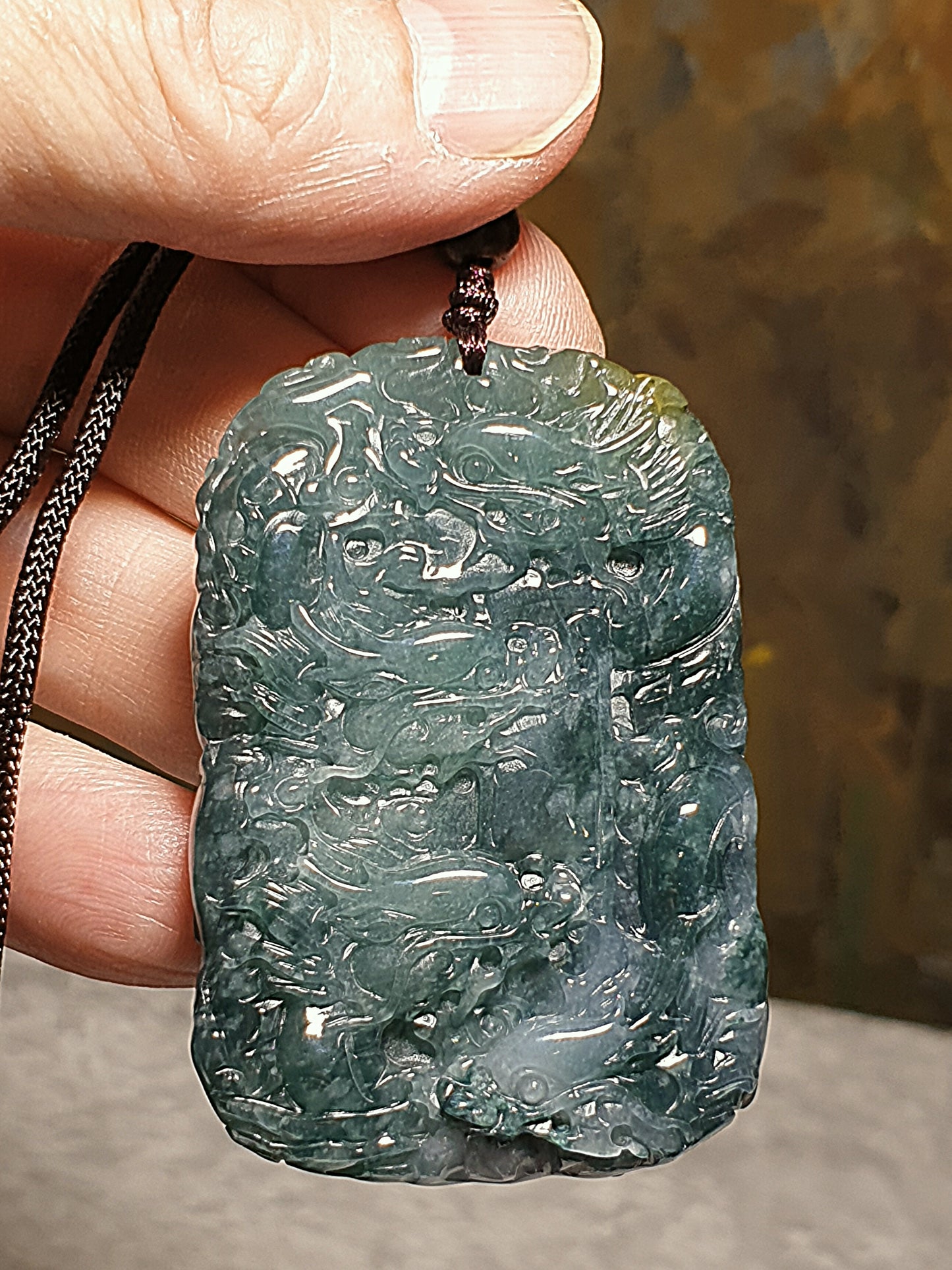 Type A Jadeite bluish green with Yellow Jadeite Nine Dragons (front 5, back 4) pendant (with certificate) 翡翠蓝绿带黄翡九龙(前五后四)吊坠(带证书)