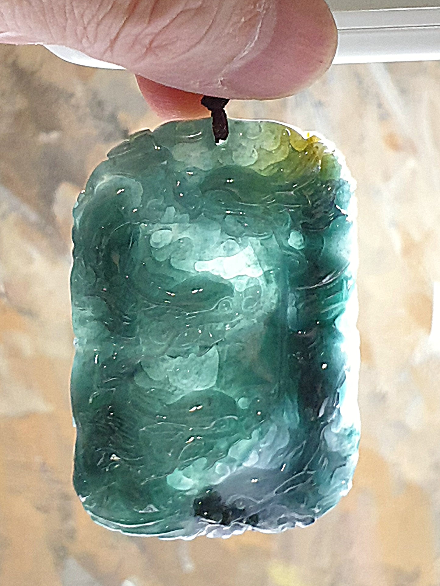 Type A Jadeite bluish green with Yellow Jadeite Nine Dragons (front 5, back 4) pendant (with certificate) 翡翠蓝绿带黄翡九龙(前五后四)吊坠(带证书)