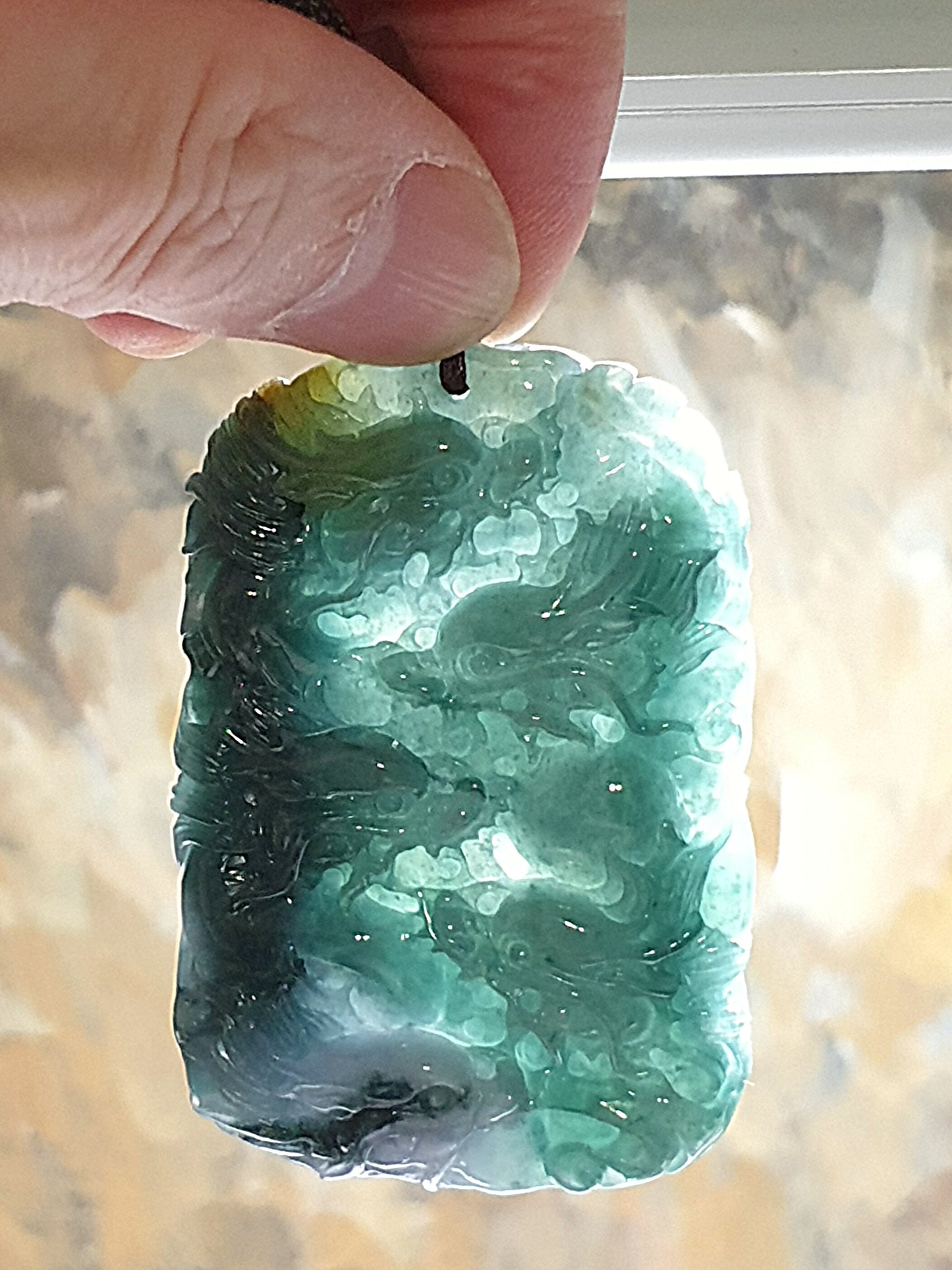 Type A Jadeite bluish green with Yellow Jadeite Nine Dragons (front 5, back 4) pendant (with certificate) 翡翠蓝绿带黄翡九龙(前五后四)吊坠(带证书)