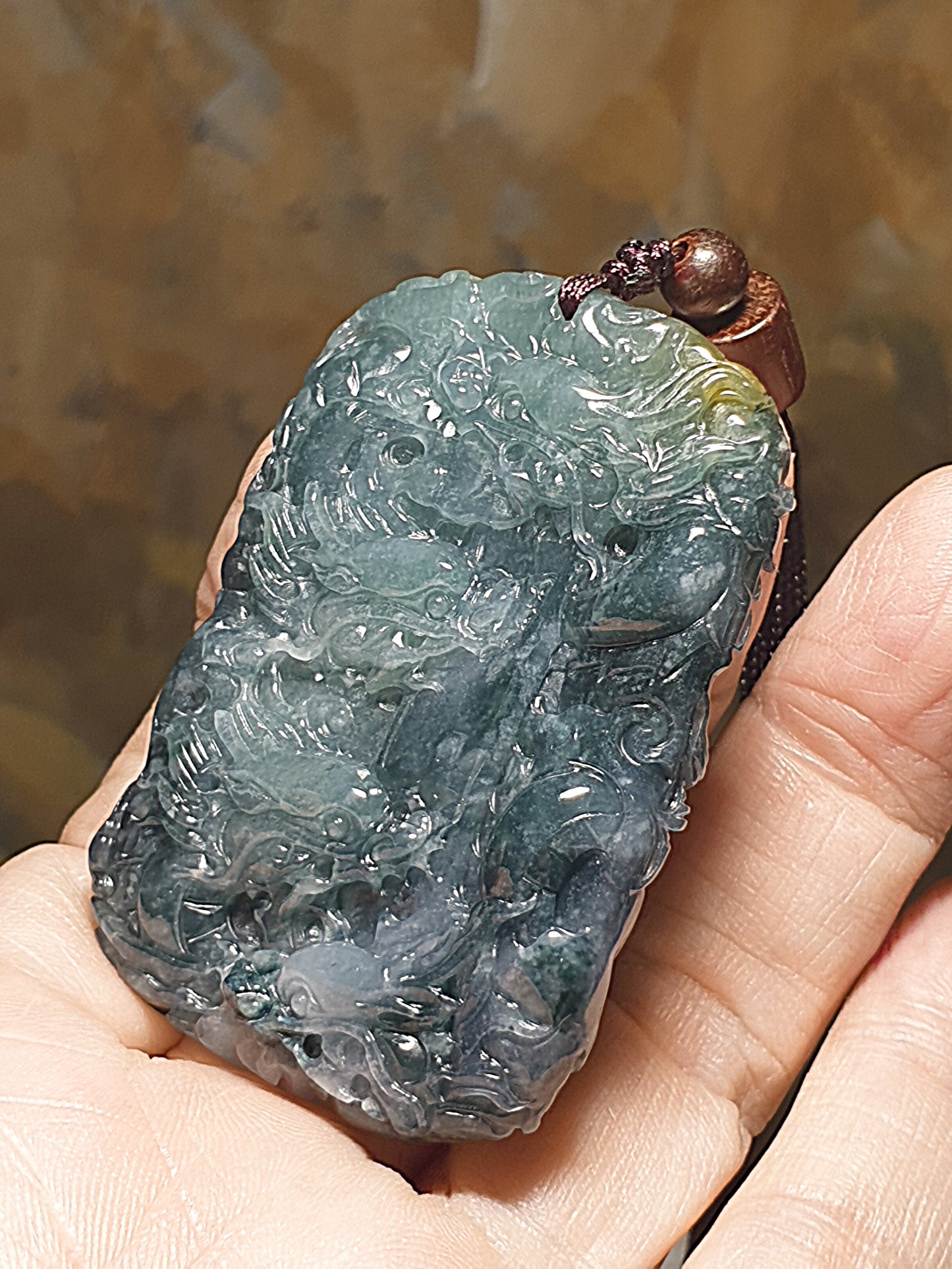 Type A Jadeite bluish green with Yellow Jadeite Nine Dragons (front 5, back 4) pendant (with certificate) 翡翠蓝绿带黄翡九龙(前五后四)吊坠(带证书)