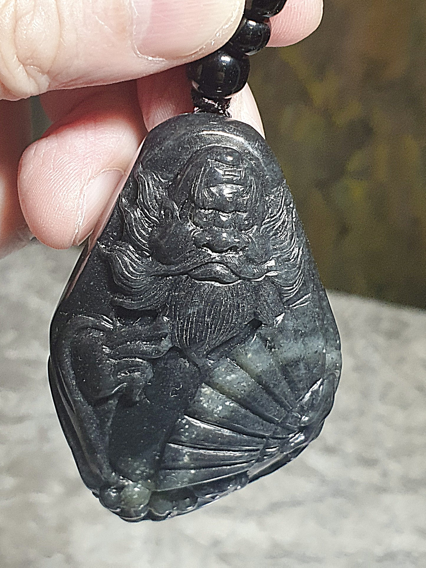 Premium Pebble Nephrite Qinghua ink black hand carved Zhong Kui palmstone (with certificate) 和田玉青花籽玉聚墨如黑全手工雕刻钟馗手把(带证书)