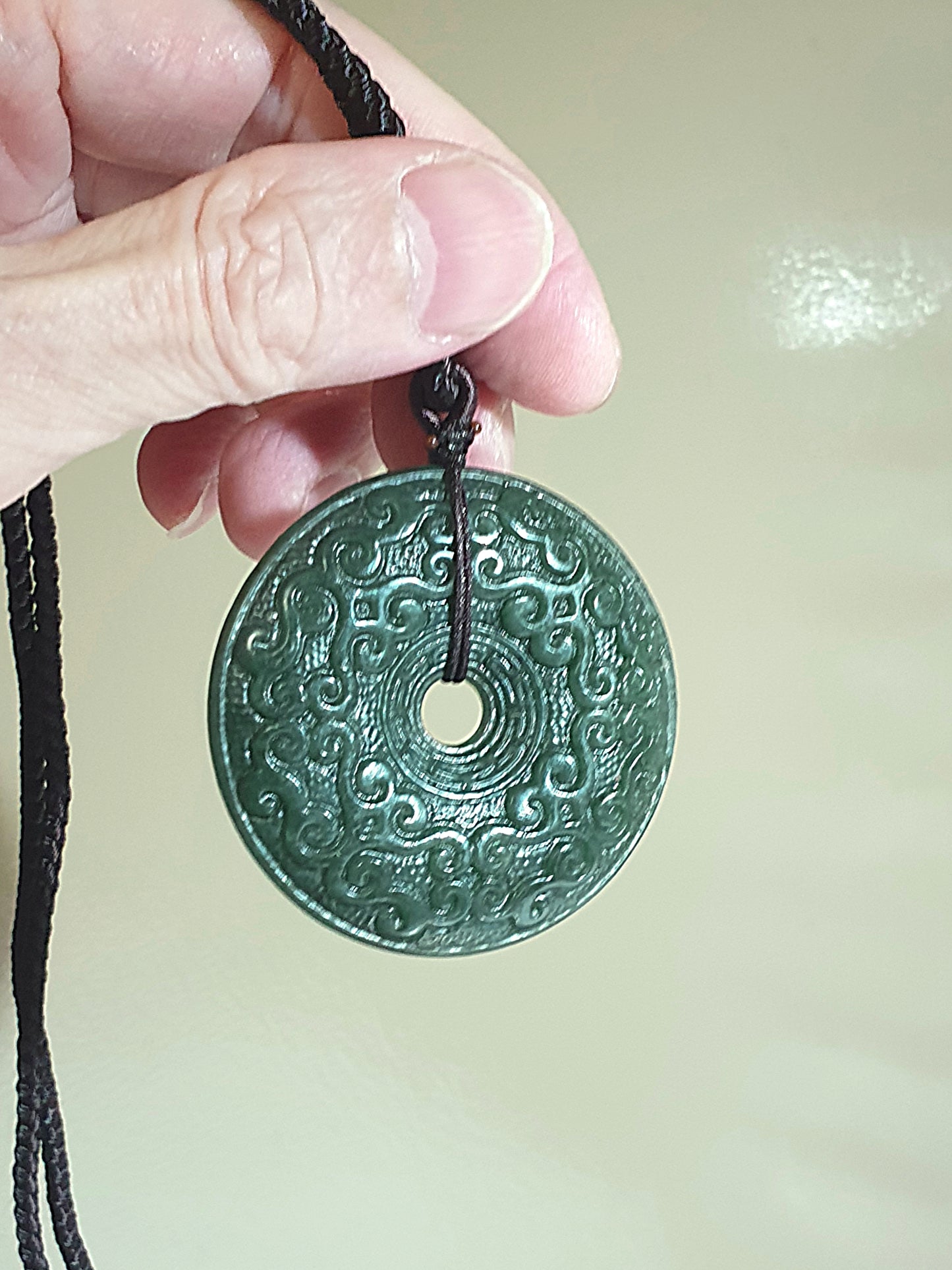 Premium Nephrite green with blue hue double sides carvings Interlaced Floral pattern Donut pendant (with certificate) 优质和田玉且末青绿带蓝调双面雕刻缠枝纹古云纹龙纹平安扣吊坠(带证书)