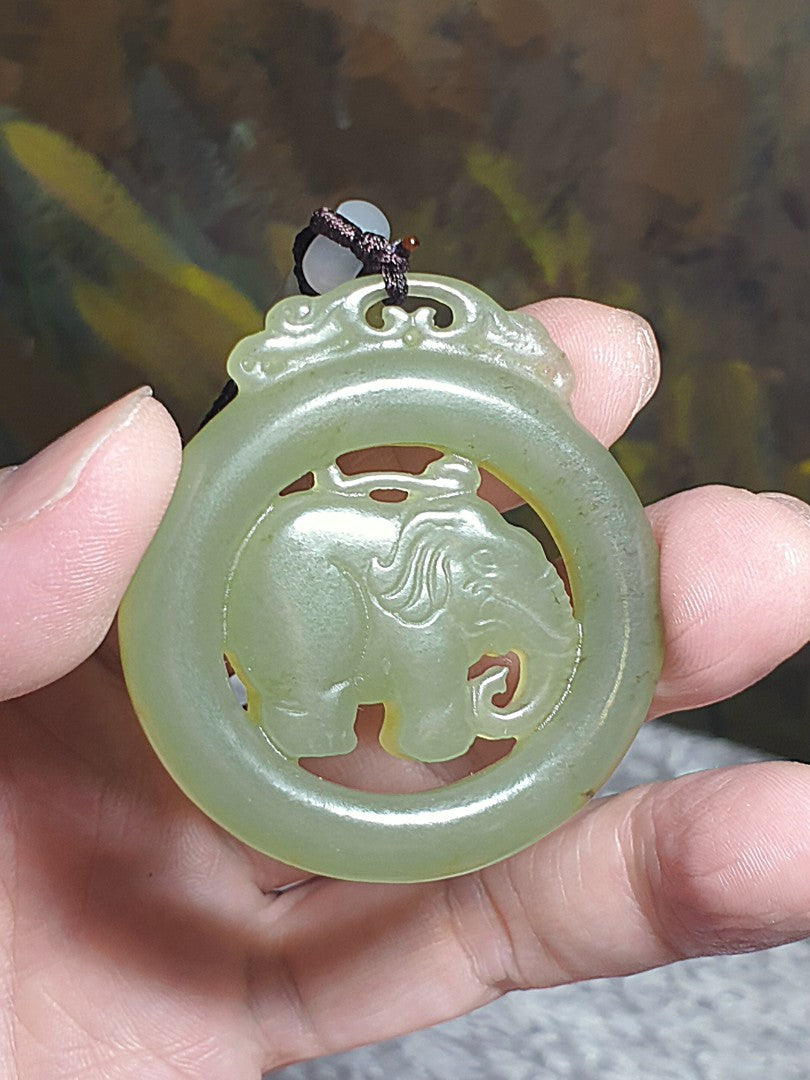 Premium Nephrite light greenish with some caramel brownish dots hollowed out & double-side carved Elephant Jade pendant (with certificate)和田玉且末青白带小许糖沁镂空双面雕刻大象吊坠(带证书)