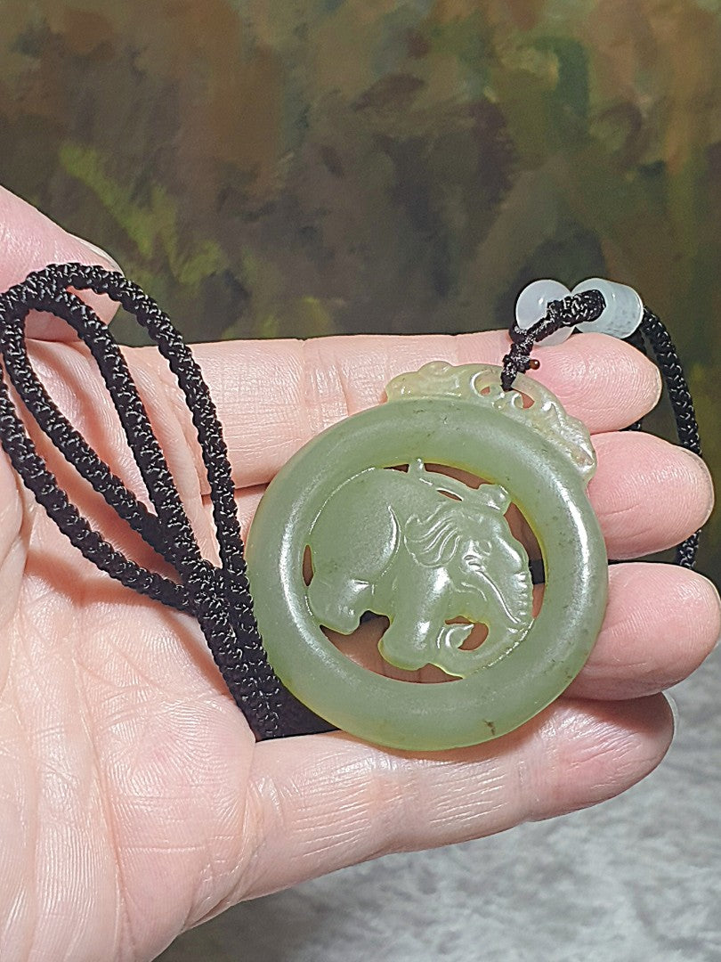 Premium Nephrite light greenish with some caramel brownish dots hollowed out & double-side carved Elephant Jade pendant (with certificate)和田玉且末青白带小许糖沁镂空双面雕刻大象吊坠(带证书)