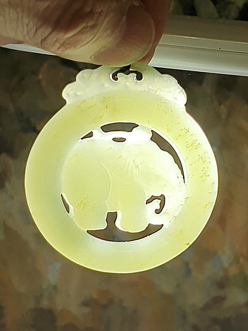Premium Nephrite light greenish with some caramel brownish dots hollowed out & double-side carved Elephant Jade pendant (with certificate)和田玉且末青白带小许糖沁镂空双面雕刻大象吊坠(带证书)