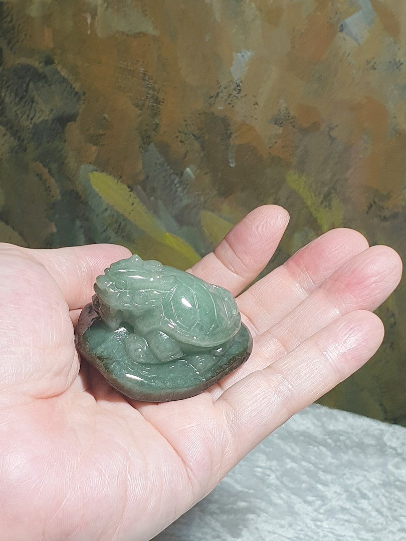 Type A Jadeite light greenish with "Jade skin" Dragon-Tortoise palmstone/small display (with certificate) 翡翠浅绿带原玉皮龙龟小把件/小摆设(带证书)