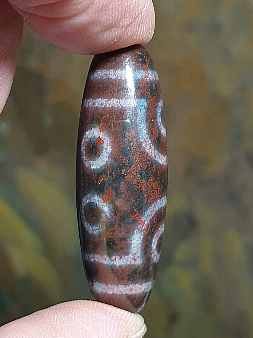 38.8mm aged Tibetan Xang Xung (Zhang Zhung) 7-Eye Purest Dzi with fine granular red spots (with certificate, free necklace cord) 38.8毫米西藏老矿象雄满朱砂至纯七眼天珠(带证书 送项链绳)