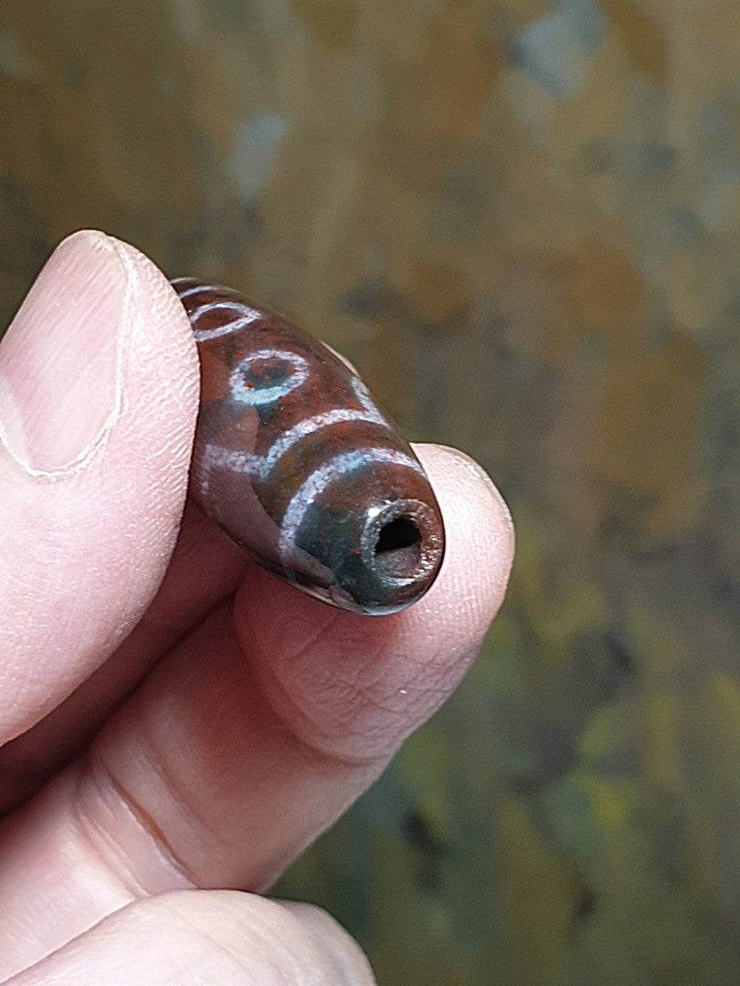 38.8mm aged Tibetan Xang Xung (Zhang Zhung) 7-Eye Purest Dzi with fine granular red spots (with certificate, free necklace cord) 38.8毫米西藏老矿象雄满朱砂至纯七眼天珠(带证书 送项链绳)