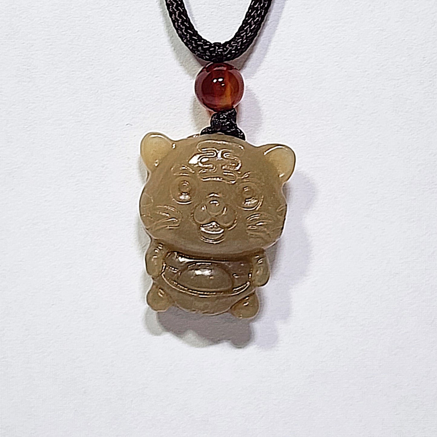 Premium natural Nephrite caramel brown 3 dimensional Tiger Jade pendant (with certificate) 和田玉且末糖立体老虎吊坠(带证书)