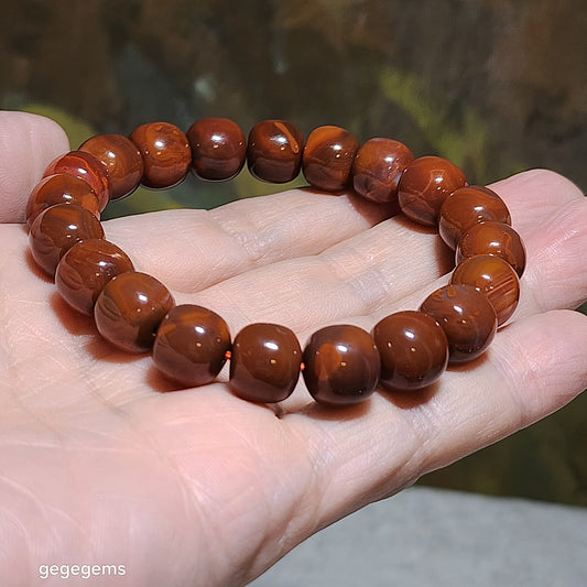 11mm Sichuan Jiu Kou Nan Hong patinaed persimmon red purple hue traditional old style beads bracelet 川料九口南红包浆料柿子红紫底老型珠手链