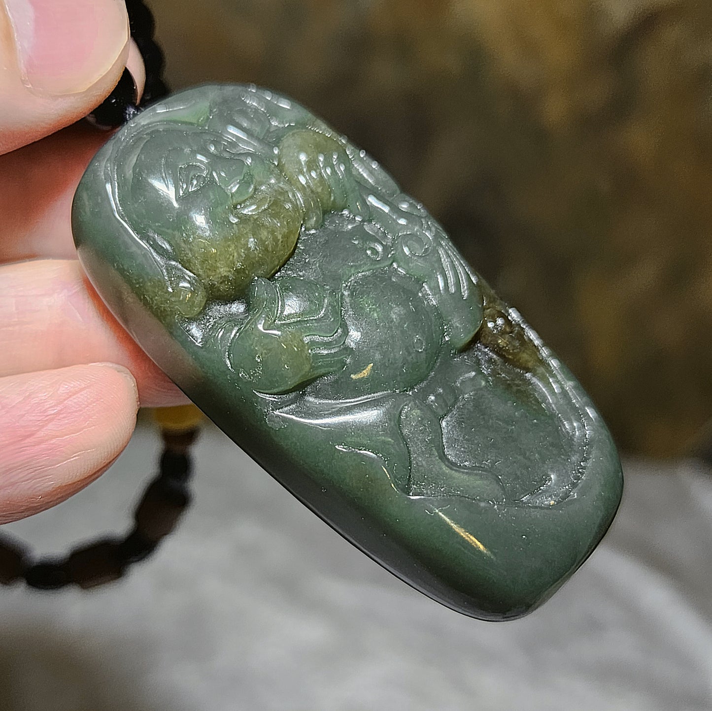 67 grams Premium Nephrite green with caramel brown Laughing Buddha Jade handheld/large pendant (with certificate) 67克优质且末和田玉绿带糖笑佛弥勒佛手把/大吊坠(带证书)