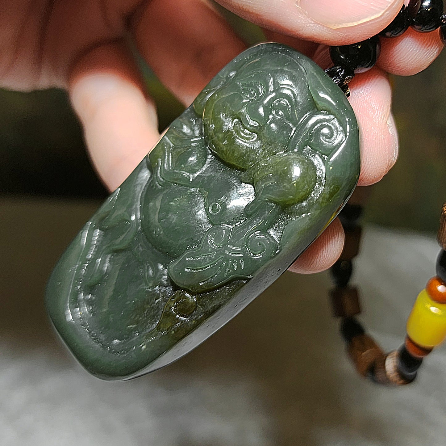 67 grams Premium Nephrite green with caramel brown Laughing Buddha Jade handheld/large pendant (with certificate) 67克优质且末和田玉绿带糖笑佛弥勒佛手把/大吊坠(带证书)