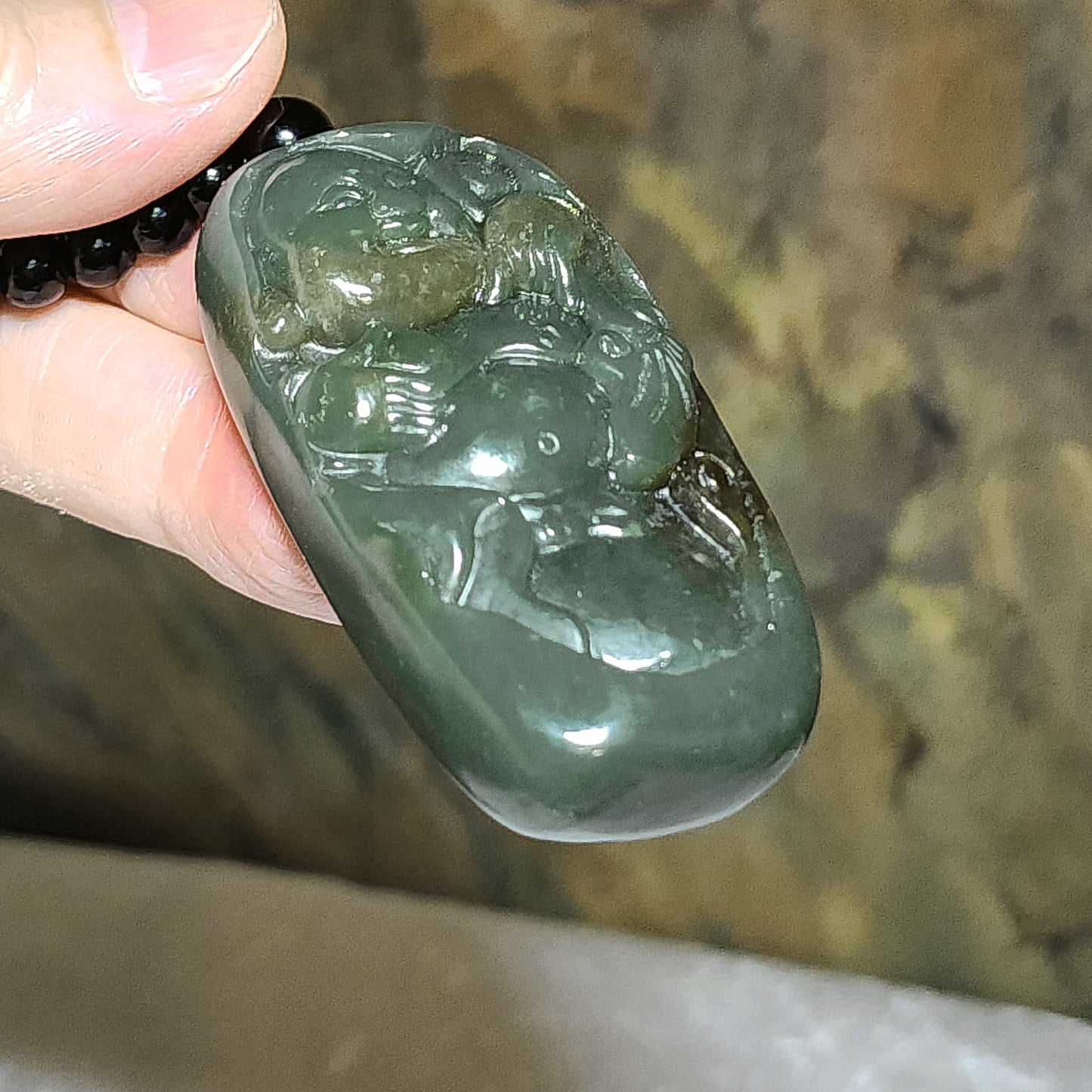 67 grams Premium Nephrite green with caramel brown Laughing Buddha Jade handheld/large pendant (with certificate) 67克优质且末和田玉绿带糖笑佛弥勒佛手把/大吊坠(带证书)