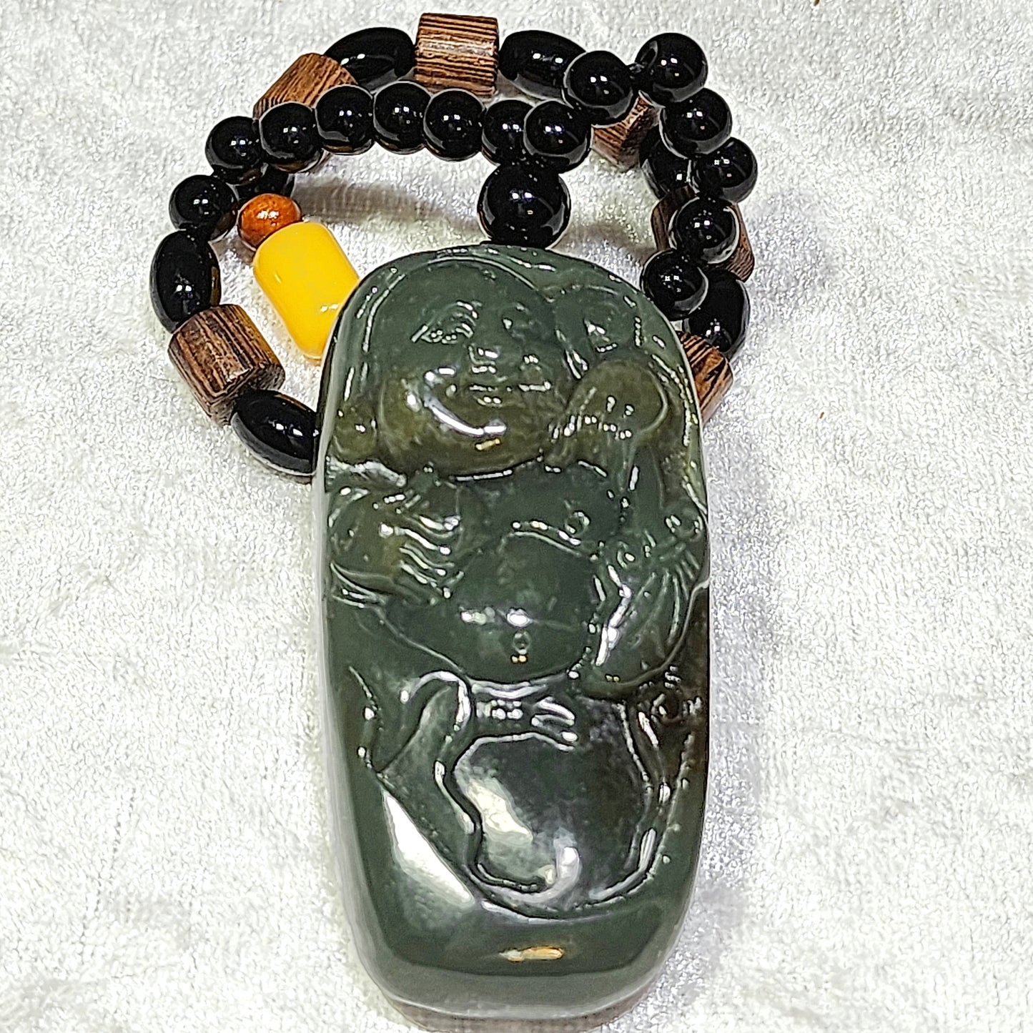 67 grams Premium Nephrite green with caramel brown Laughing Buddha Jade handheld/large pendant (with certificate) 67克优质且末和田玉绿带糖笑佛弥勒佛手把/大吊坠(带证书)