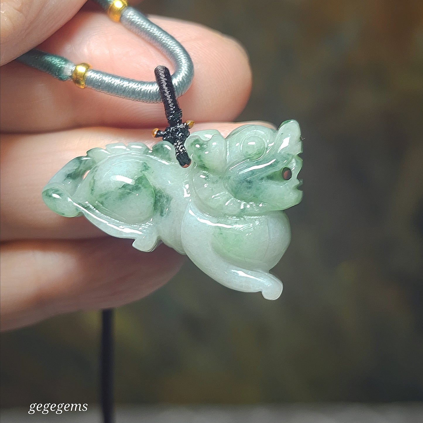 Premium Type A Jadeite floating flowers light green Qilin Jade pendant (with certificate) 优质翡翠飘花淡绿麒麟吊坠(带证书)
