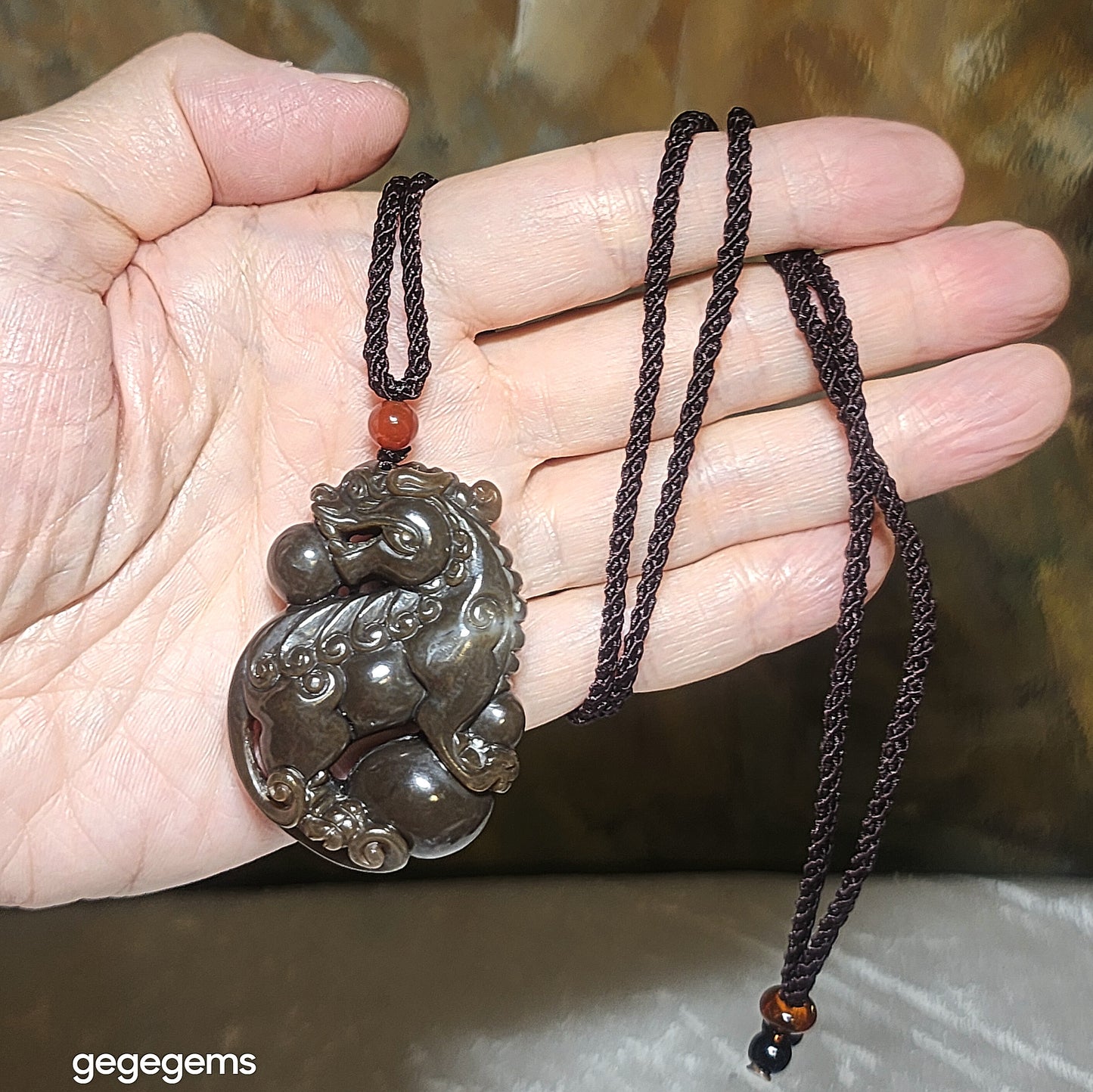 Premium Nephrite deep caramel brown greasy 3 dimensional Pi Xiu pendant (with certificate) 精品且末和田玉老褐糖油润立体貔貅吊坠(带证书)
