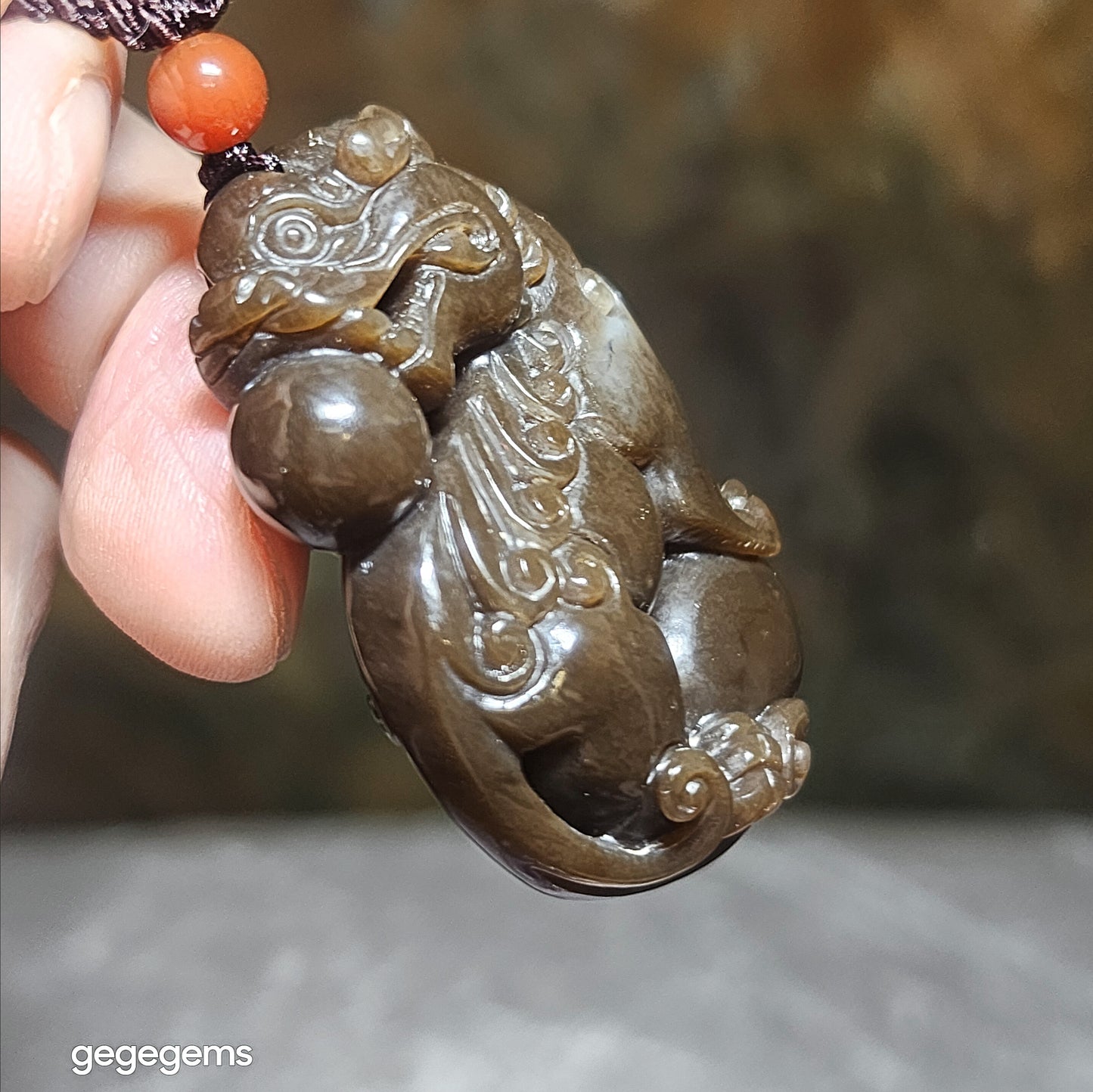 Premium Nephrite deep caramel brown greasy 3 dimensional Pi Xiu pendant (with certificate) 精品且末和田玉老褐糖油润立体貔貅吊坠(带证书)