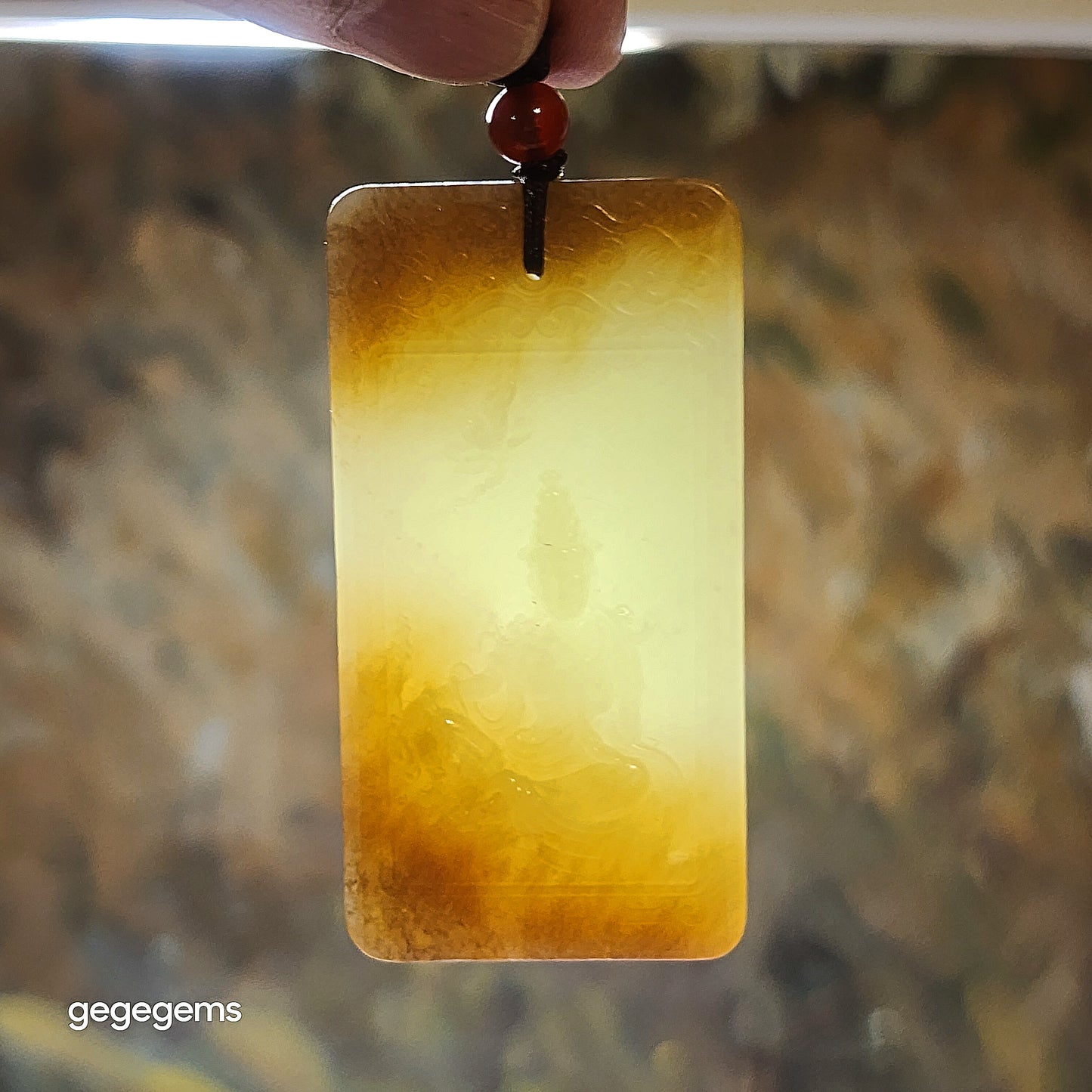Gegegems rare premium Nephrite yellow hue Heaven and Earth caramel brown good greasiness Guan Yin Jade pendant (with certificate) 罕见精品和田玉且末黄口料天地糖油润观音牌子(带证书)