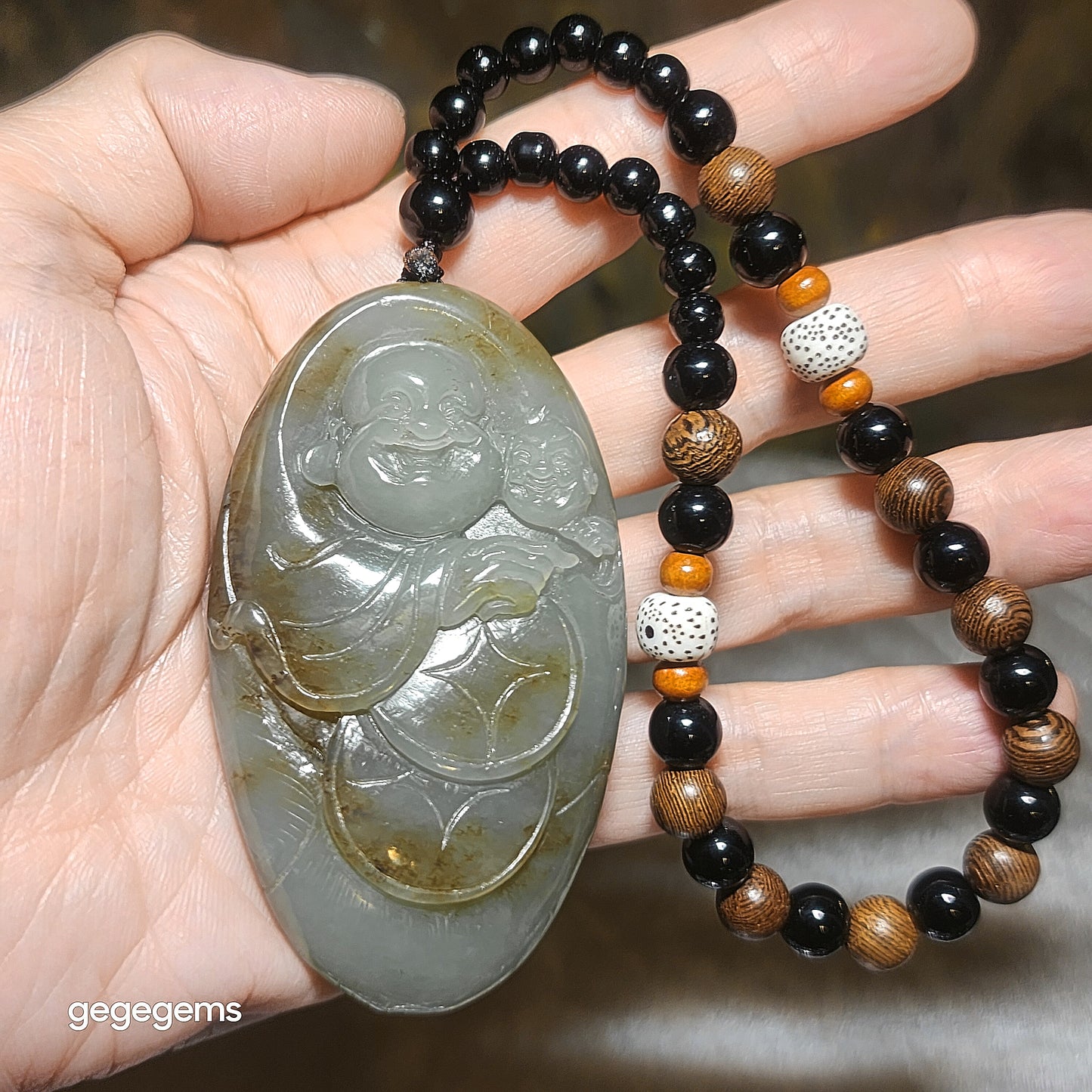 Premium Nephrite caramel brown blue green good greasiness Laughing Buddha & Lucky Boy handheld (with certificate) 优质且末糖蓝调油润和田玉佛童子荷叶把件(带证书)