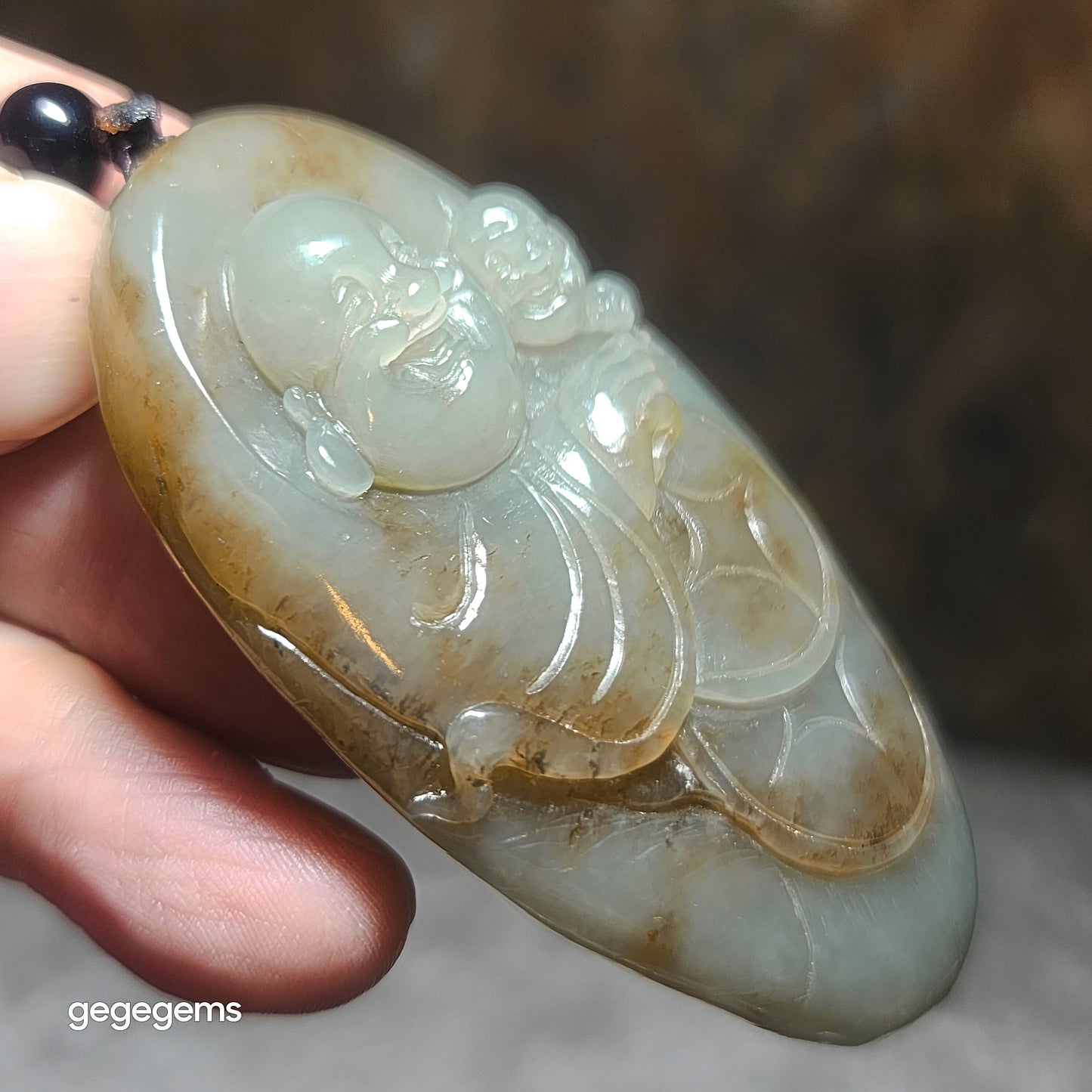 Premium Nephrite caramel brown blue green good greasiness Laughing Buddha & Lucky Boy handheld (with certificate) 优质且末糖蓝调油润和田玉佛童子荷叶把件(带证书)