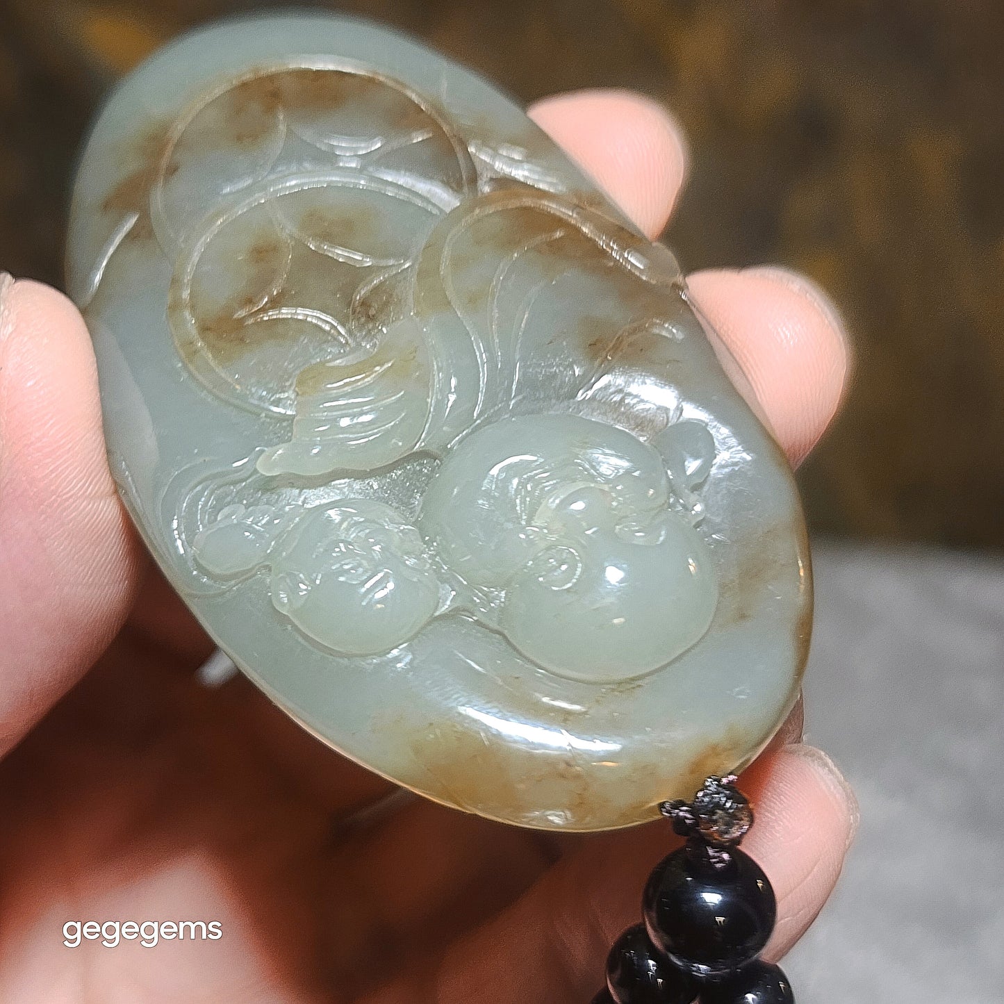 Premium Nephrite caramel brown blue green good greasiness Laughing Buddha & Lucky Boy handheld (with certificate) 优质且末糖蓝调油润和田玉佛童子荷叶把件(带证书)