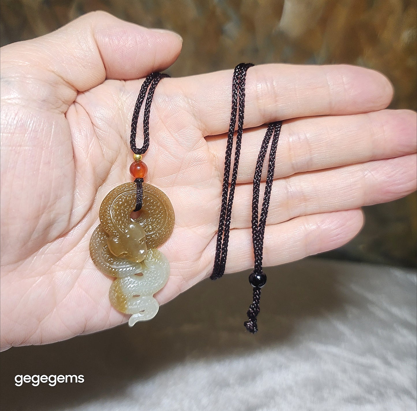 Premium Nephrite caramel brown warm white two tones Snake Jade pendant (with certificate) 优质和田玉且末糖暖白双色蛇吊坠(带证书)